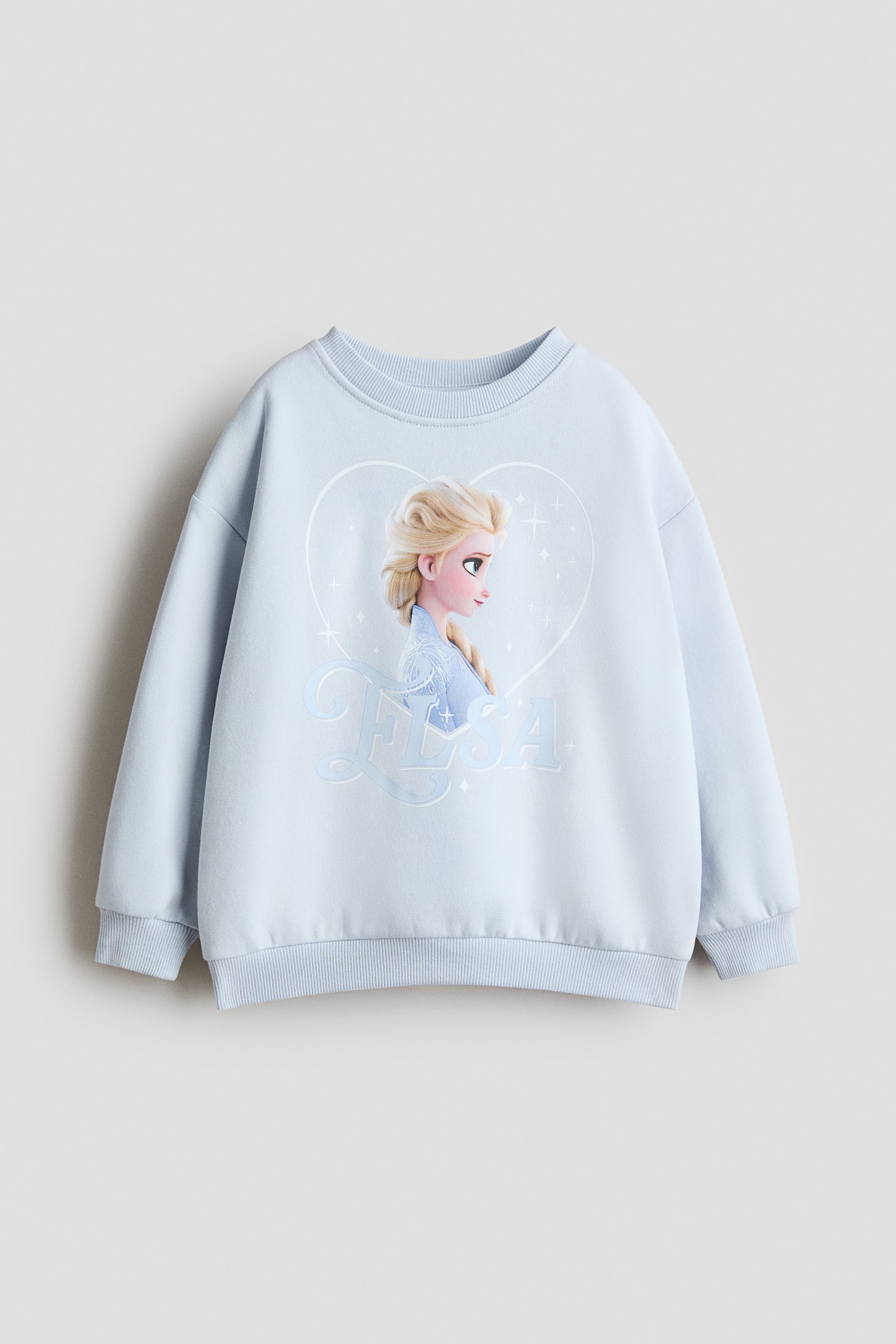 Printed sweatshirt - Light blue/Frozen/Pink/Minnie Mouse/Light beige/Lilo & Stitch/Cream/Hello Kitty/Pink/Tweety/Cream/Donald Duck/Purple/Lilo & Stitch/Light pink/Squishmallows/White/Minnie Mouse/Light dusty green/Pokémon/White/Frozen/Cream/Minnie Mouse/Light blue/Frozen