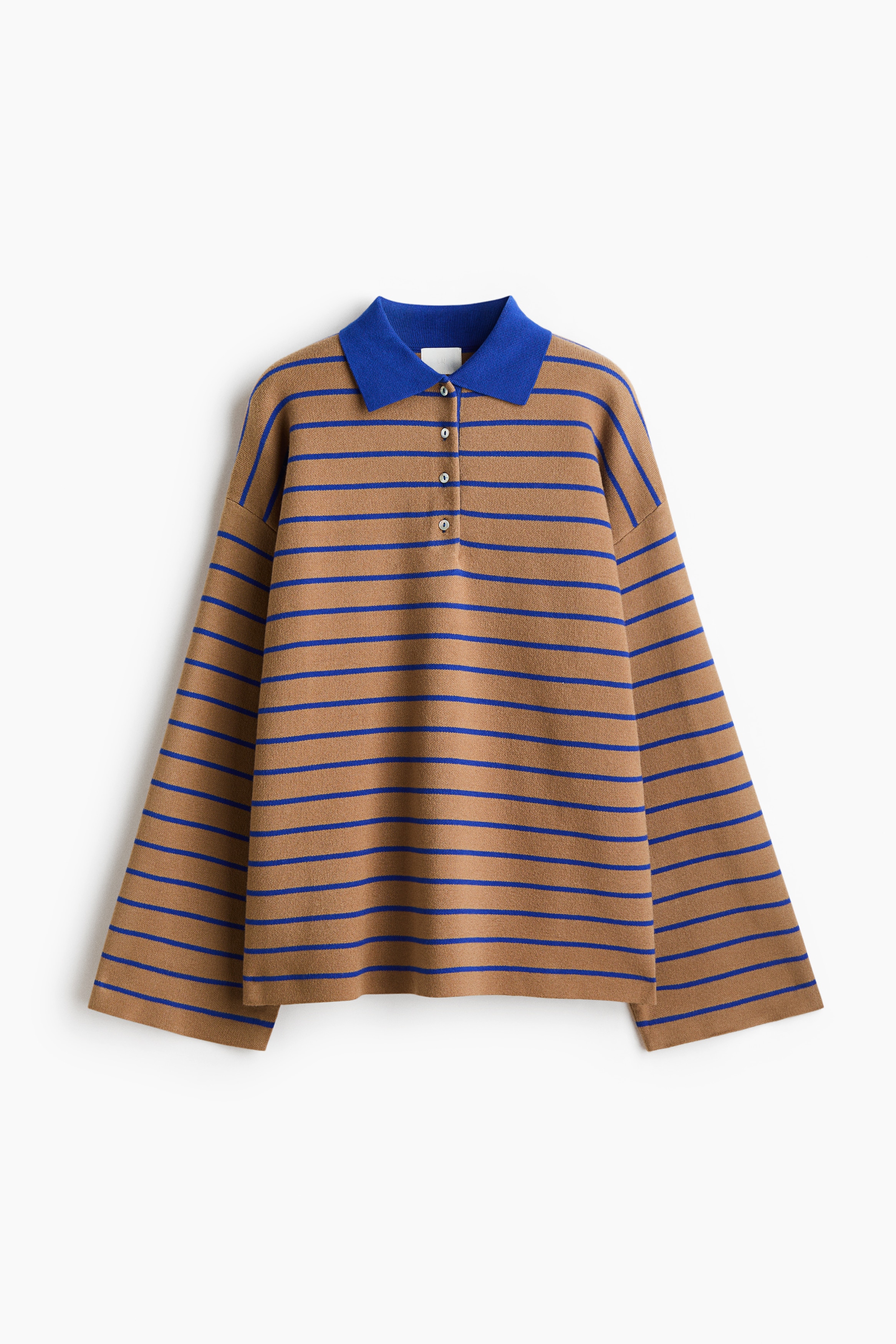 An oversized polo shirt is shown from the front, featuring a relaxed, slouchy fit in a brown knit fabric with thin horizontal blue stripes. The shirt features a contrasting solid blue collar with a partially open button placket and wide, elongated sleeves that drape loosely.