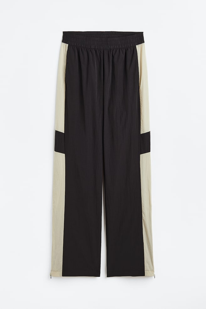 Pantalon de survêtement coupe-vent avec zips - Noir/color block - 1