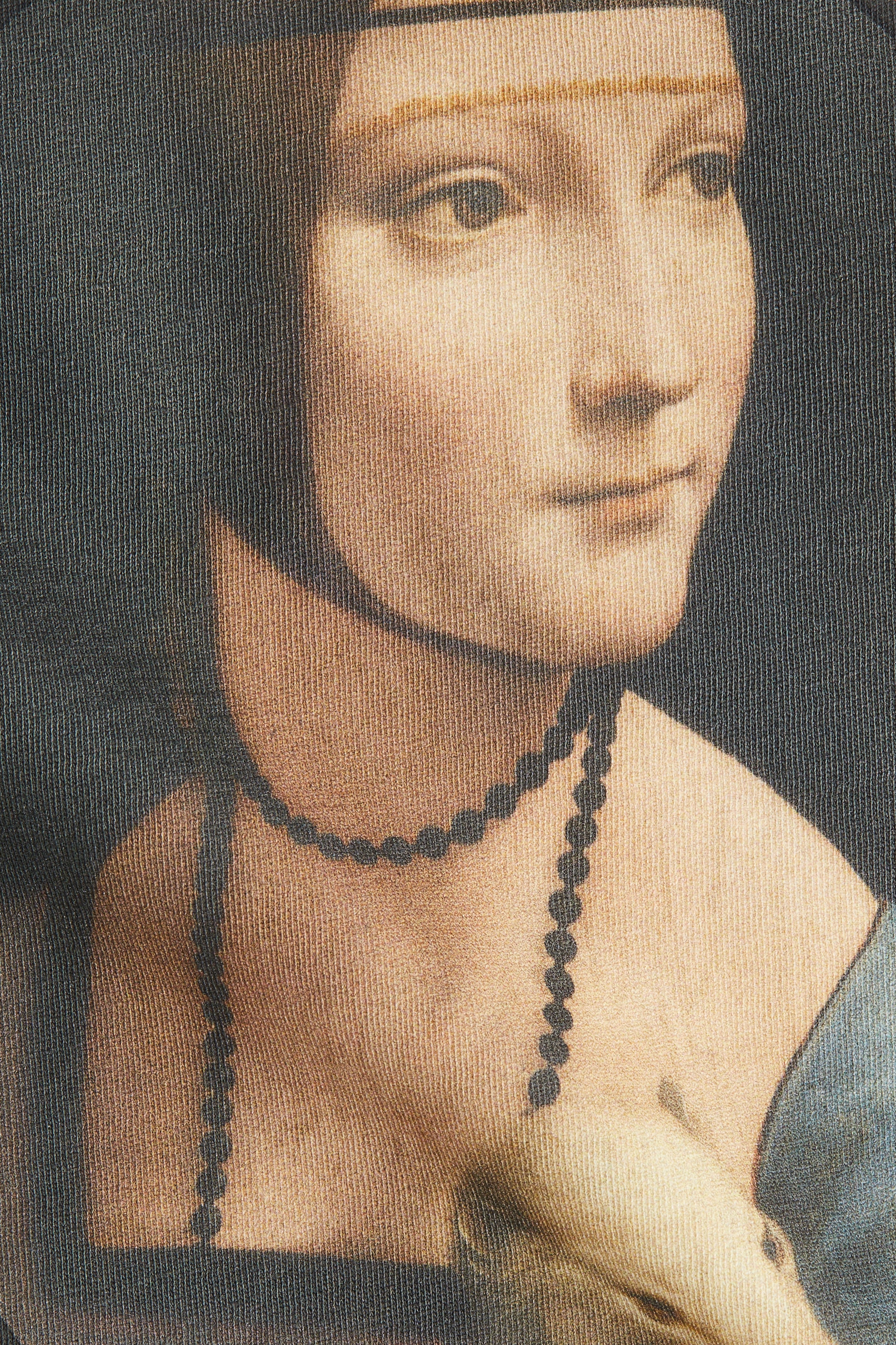 View larger image: An oversized T-shirt is featuring a detailed classic portrait print on its front, rendered on a textured cotton jersey fabric.