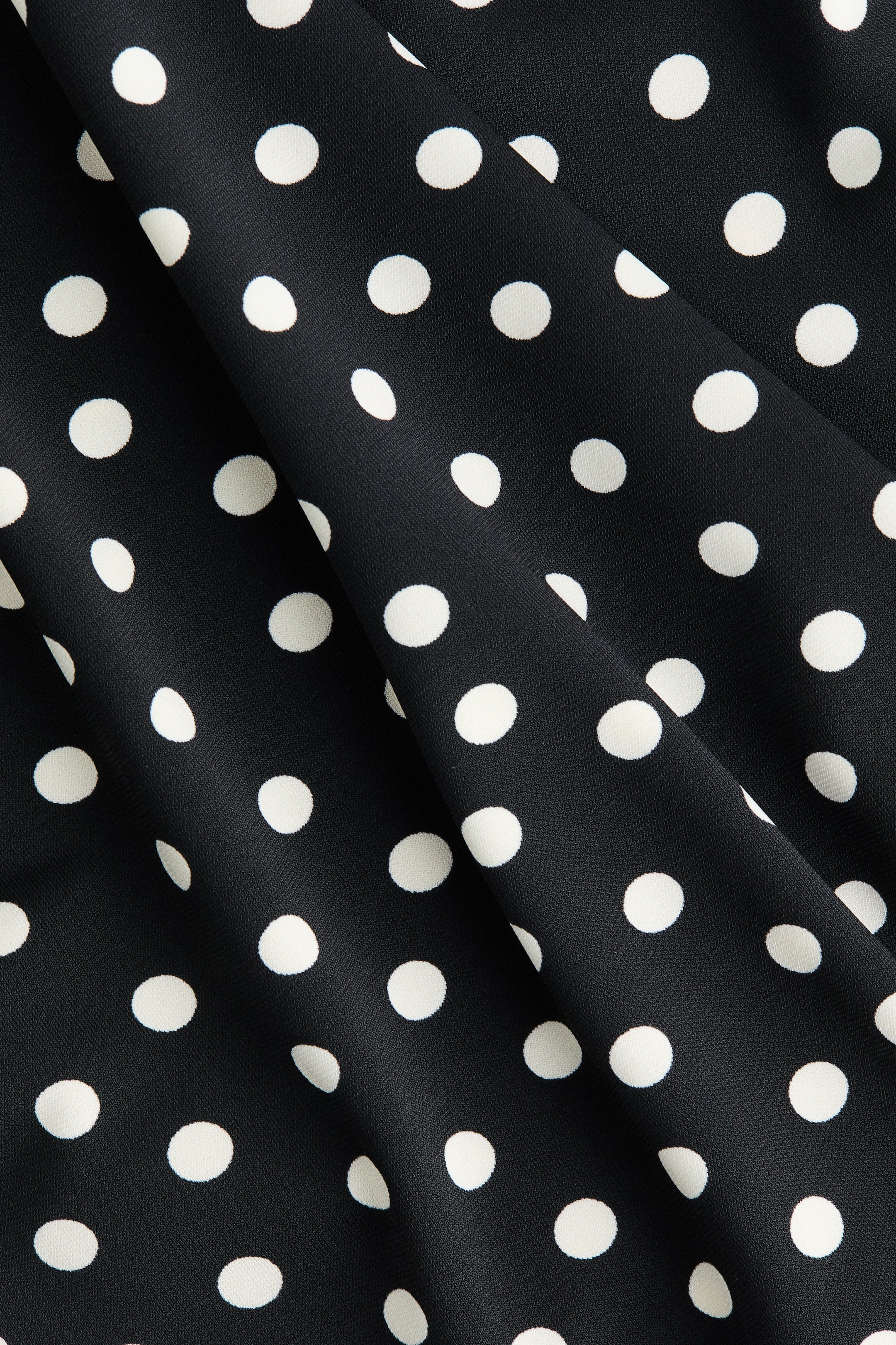 Jupe midi à effet drapé