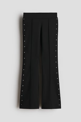 Utsvängda leggings med nitar