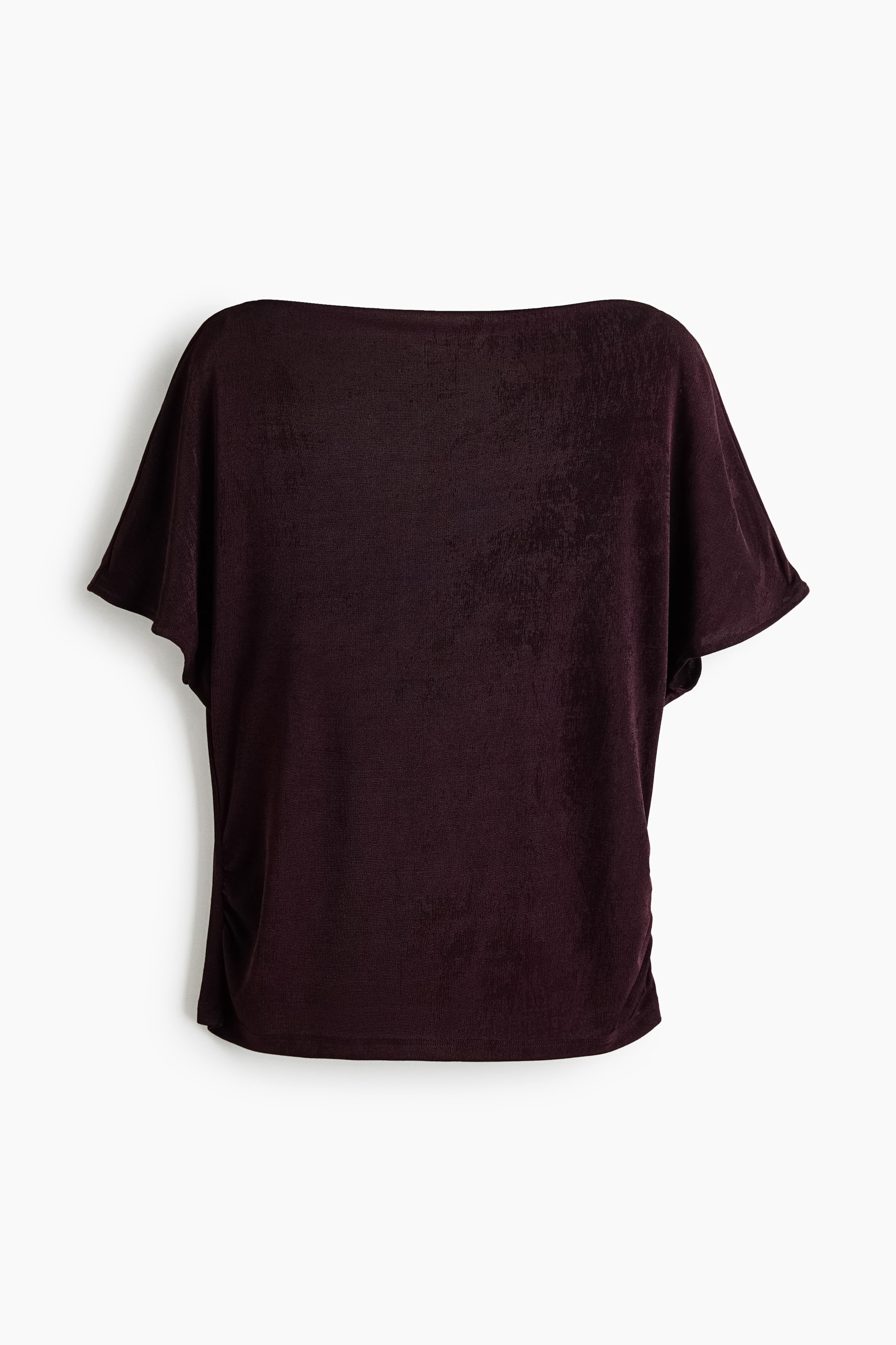 View larger image: A dark burgundy velour-textured top is shown from the front, featuring a wide boat neckline and draped short dolman sleeves. The relaxed-fit top has subtle ruching along the side seams near the straight hem.