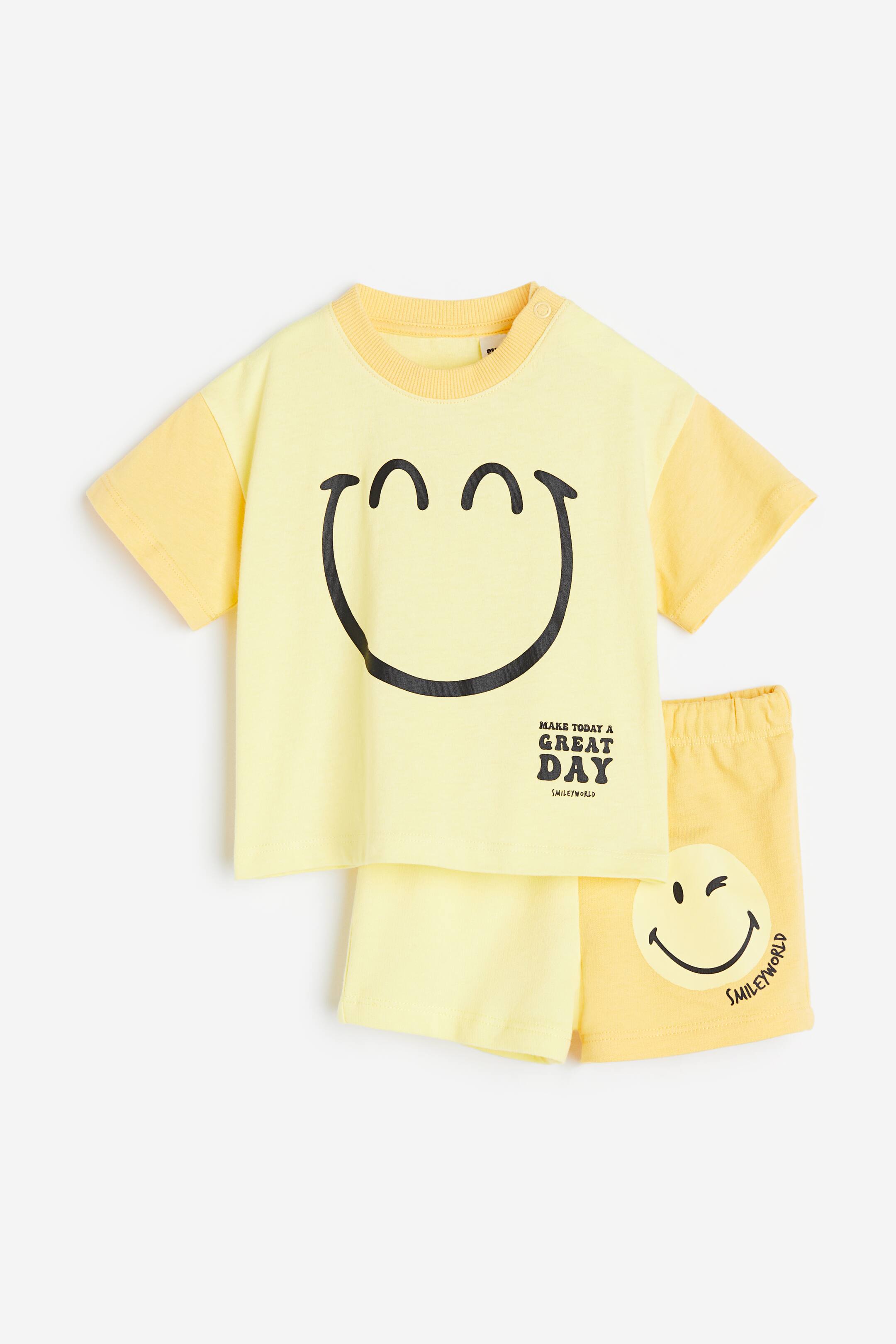 View larger image: 2-piece Cotton Set - Light yellow/SmileyWorld® - Kids | H&M PH 1