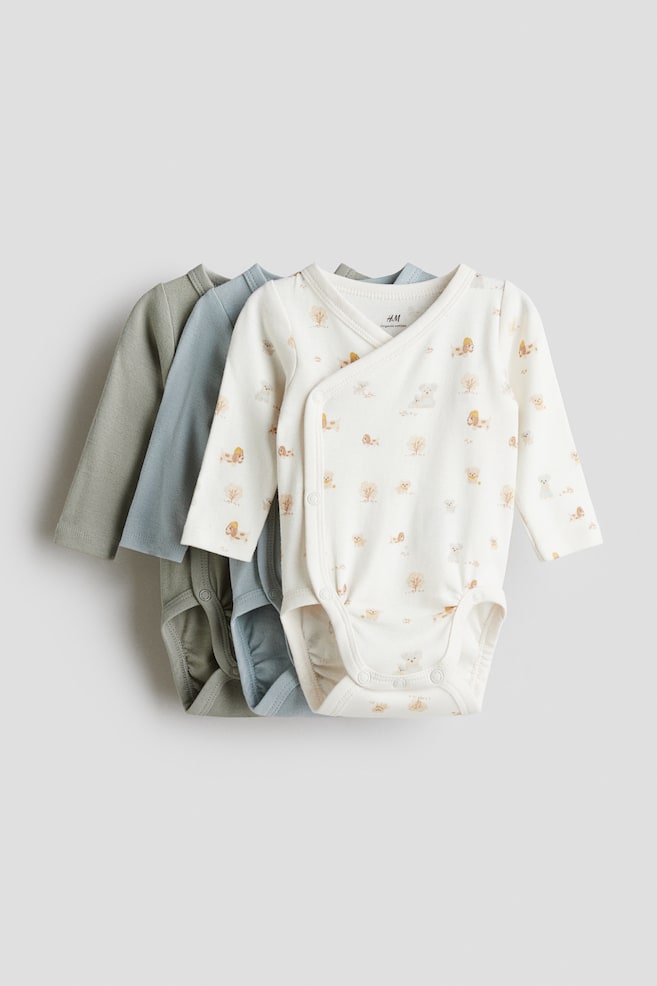 3-pack wrapover bodysuits - Green/Patterned/Dusty pink/Floral/Light dusty pink/Cream/White/Teddy bears/Cream/Puppies/Cream/Stars/Beige/Teddy bears/Light blue/Teddy bears/White/Animals/Cream/Striped/Light pink/Floral/Pink/Floral/White/Bunnies/White/Beige/Koalas - 1
