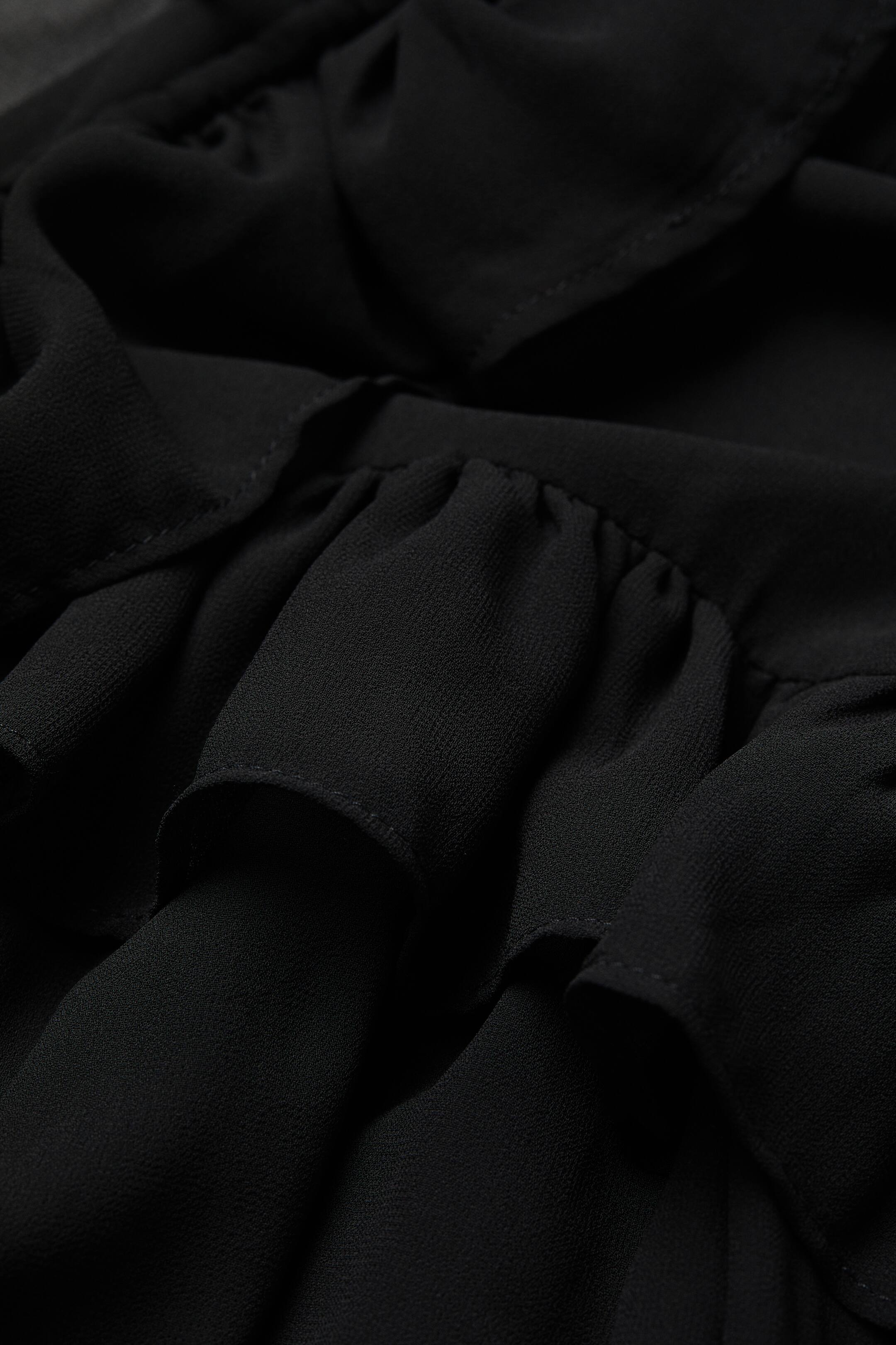 הצגת תמונה גדולה יותר: חולצת שיפון עם וולנים - שחור - Ladies | H&M IL 2