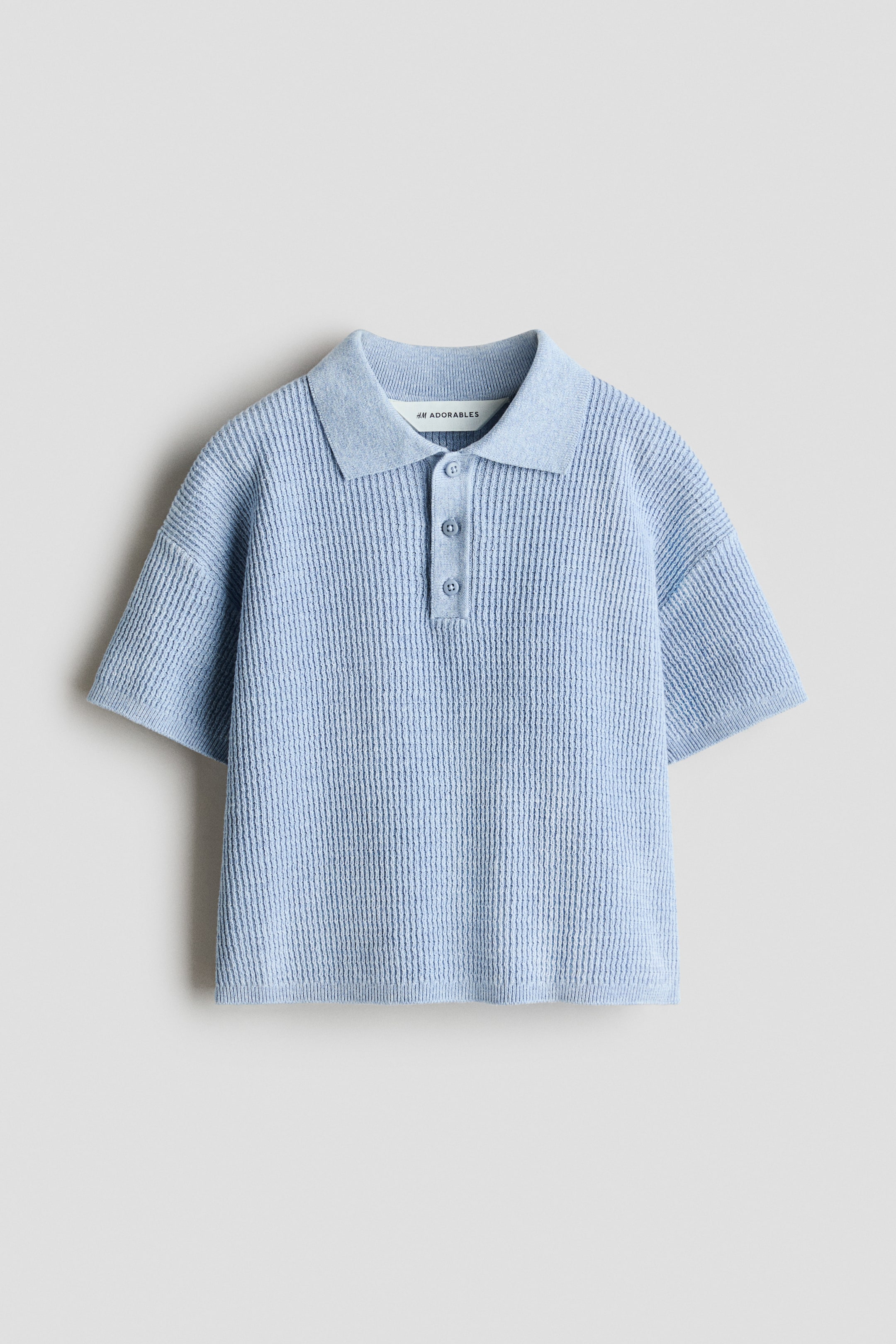 Polo en tricot côtelé
