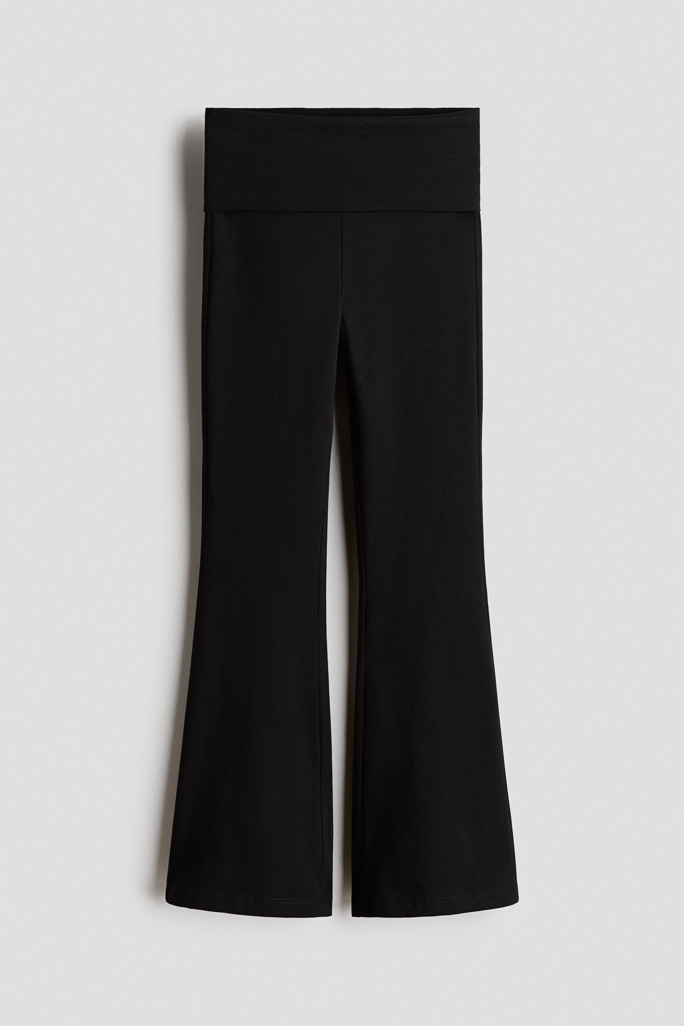 Расклешенные леггинсы с закругленной талией