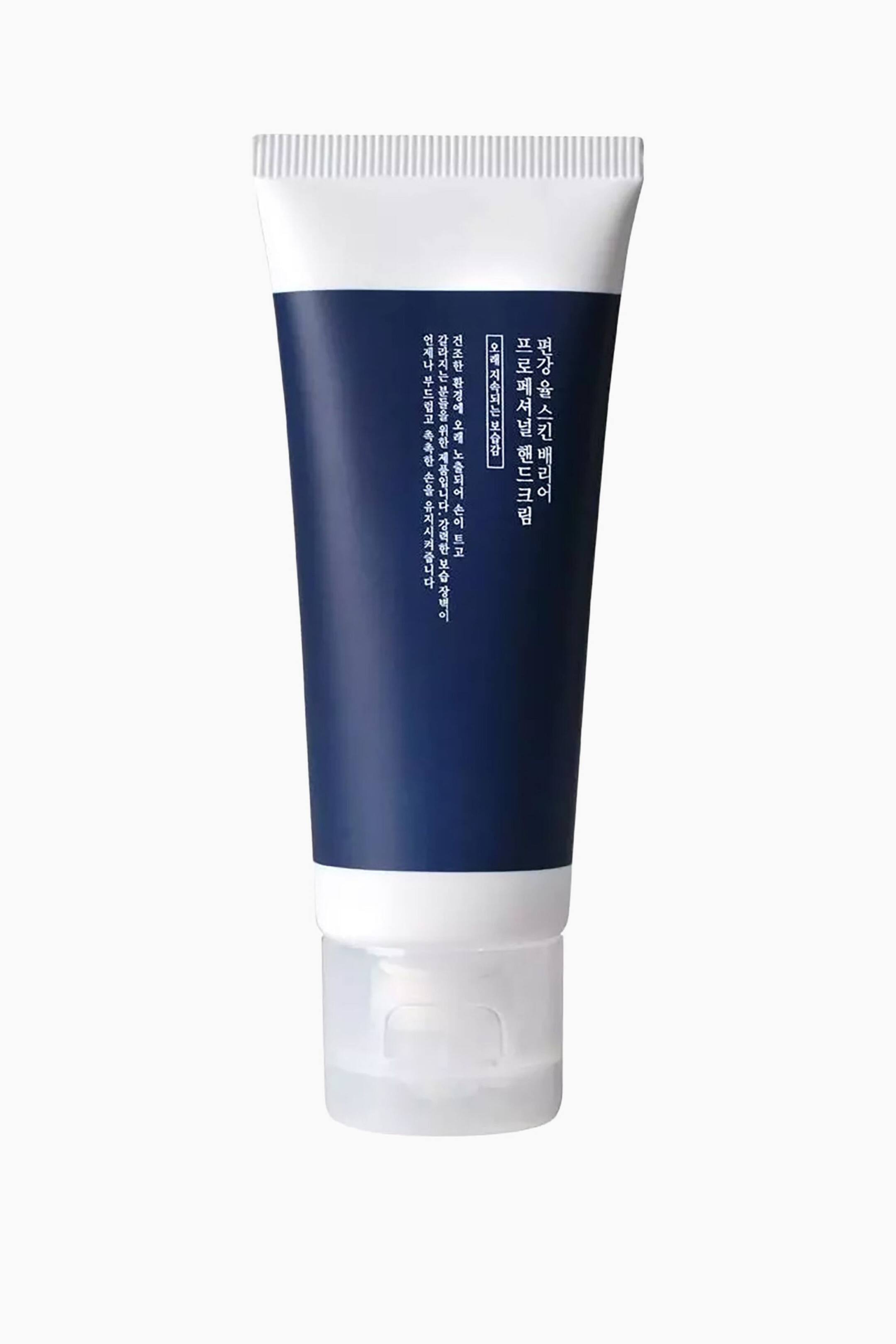 Vis større bilde: En klemmetube står oppreist, med en hvit rillet topp, en mørkeblå kropp med vertikalt justert koreansk tekst, og en gjennomsiktig flip-top kork.