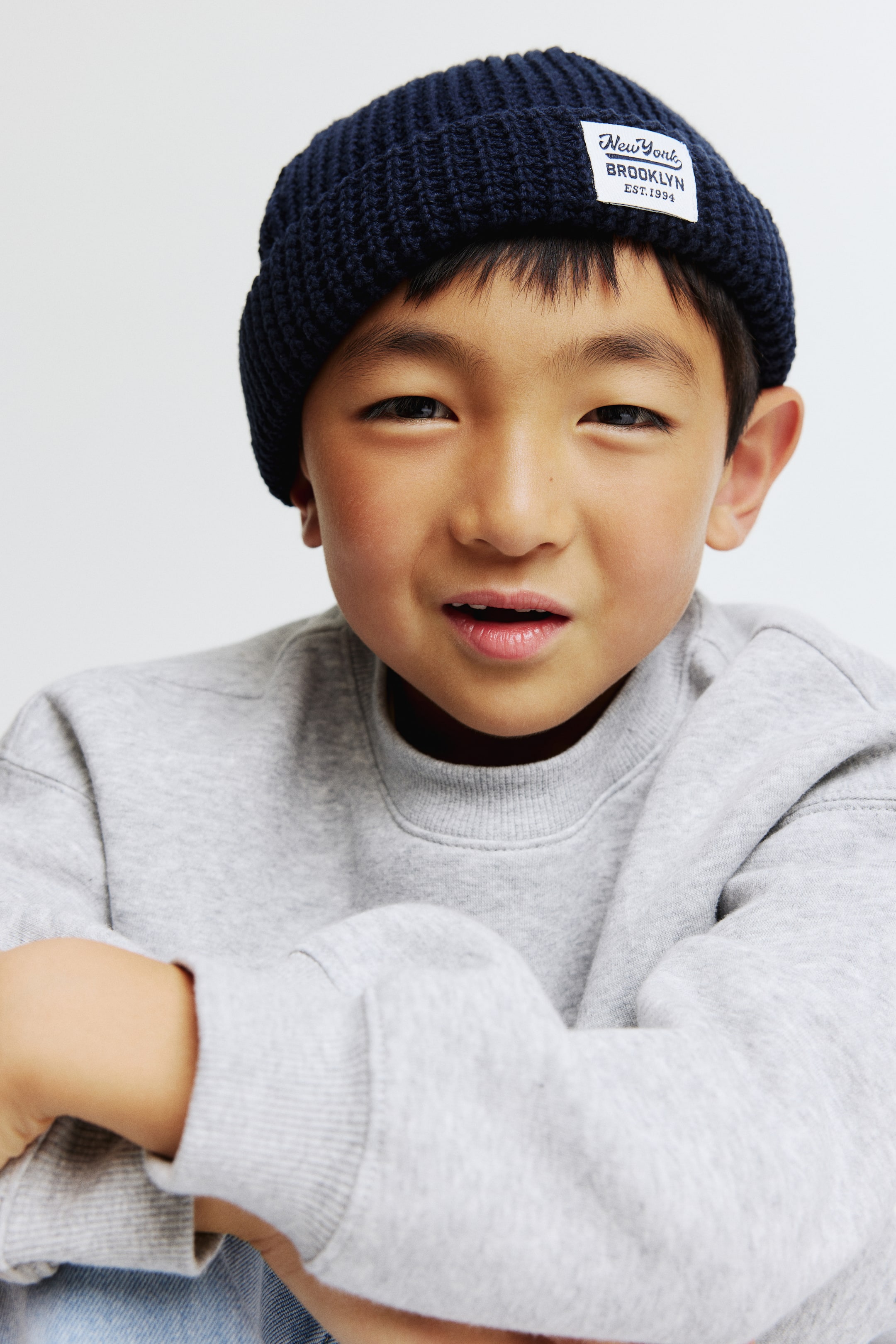 Ampliar la imagen: Gorro en tejido texturizado - Azul marino/Brooklyn - Kids | H&M MX 1