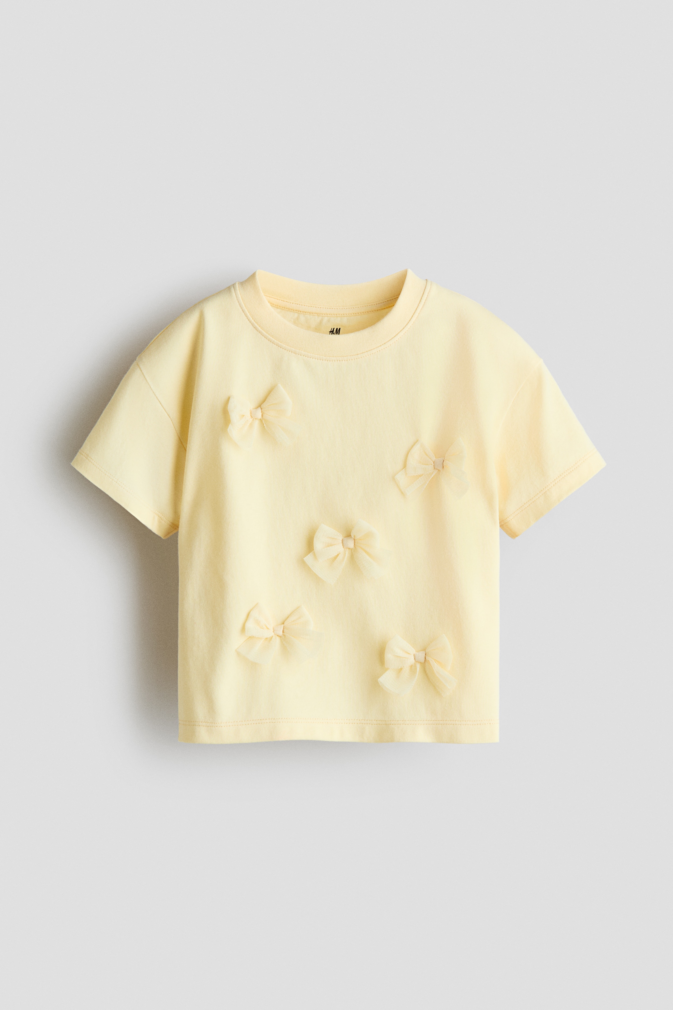 Light yellow/bows Embellished T-Shirt for kids | H&M US