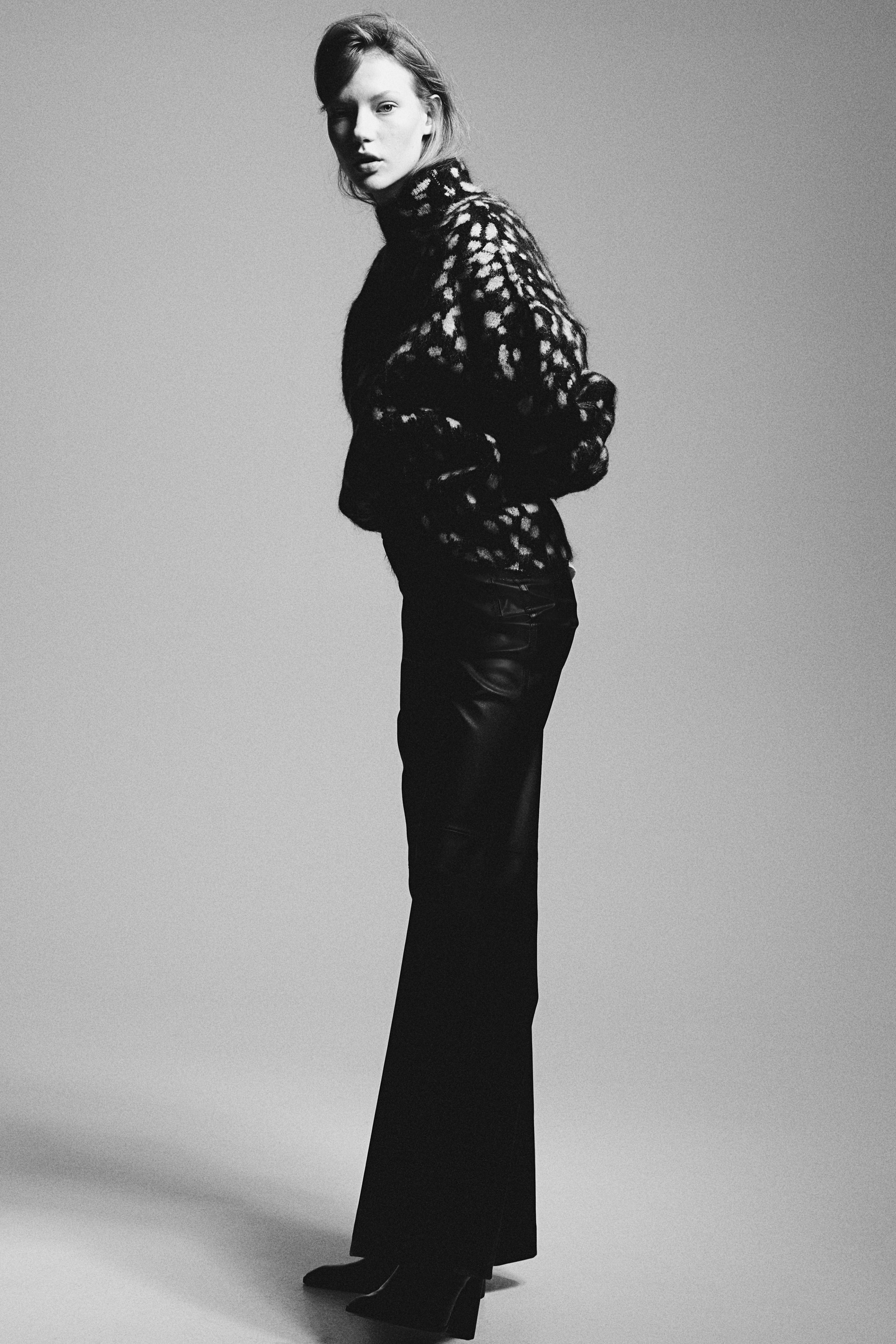 Flared coated trousers