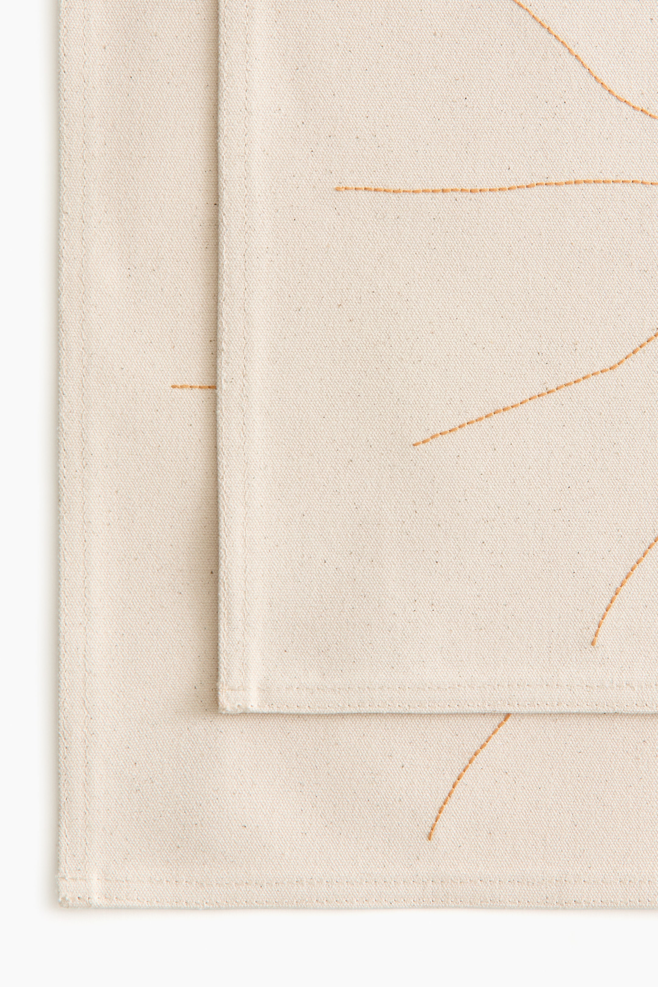 2-pack embroidery-detail place mats