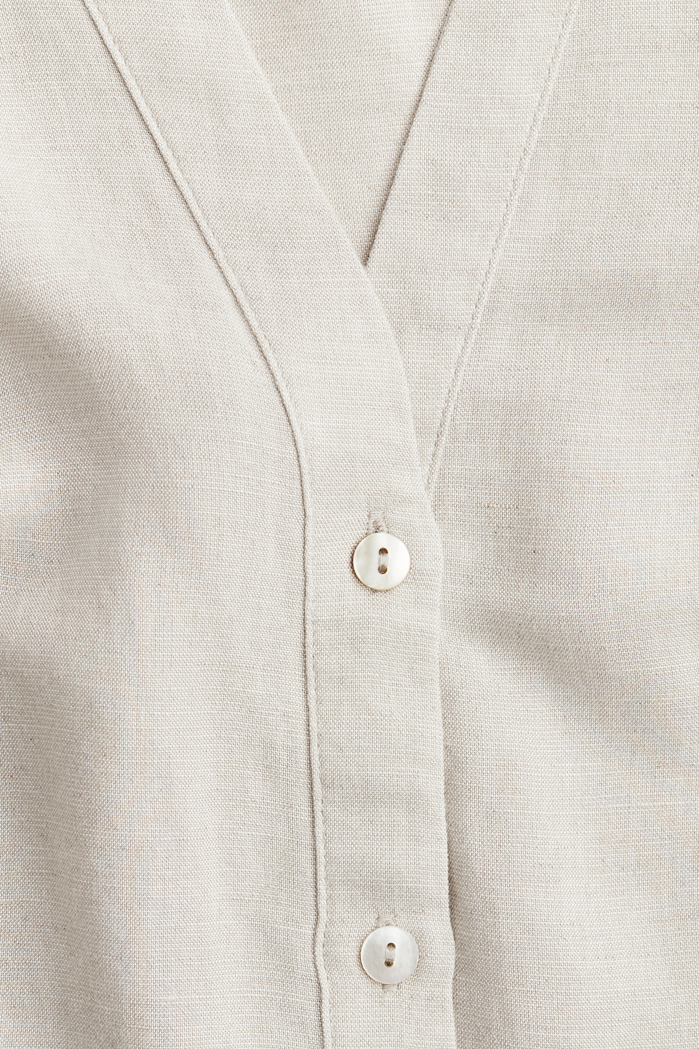 Sleeveless linen-blend blouse