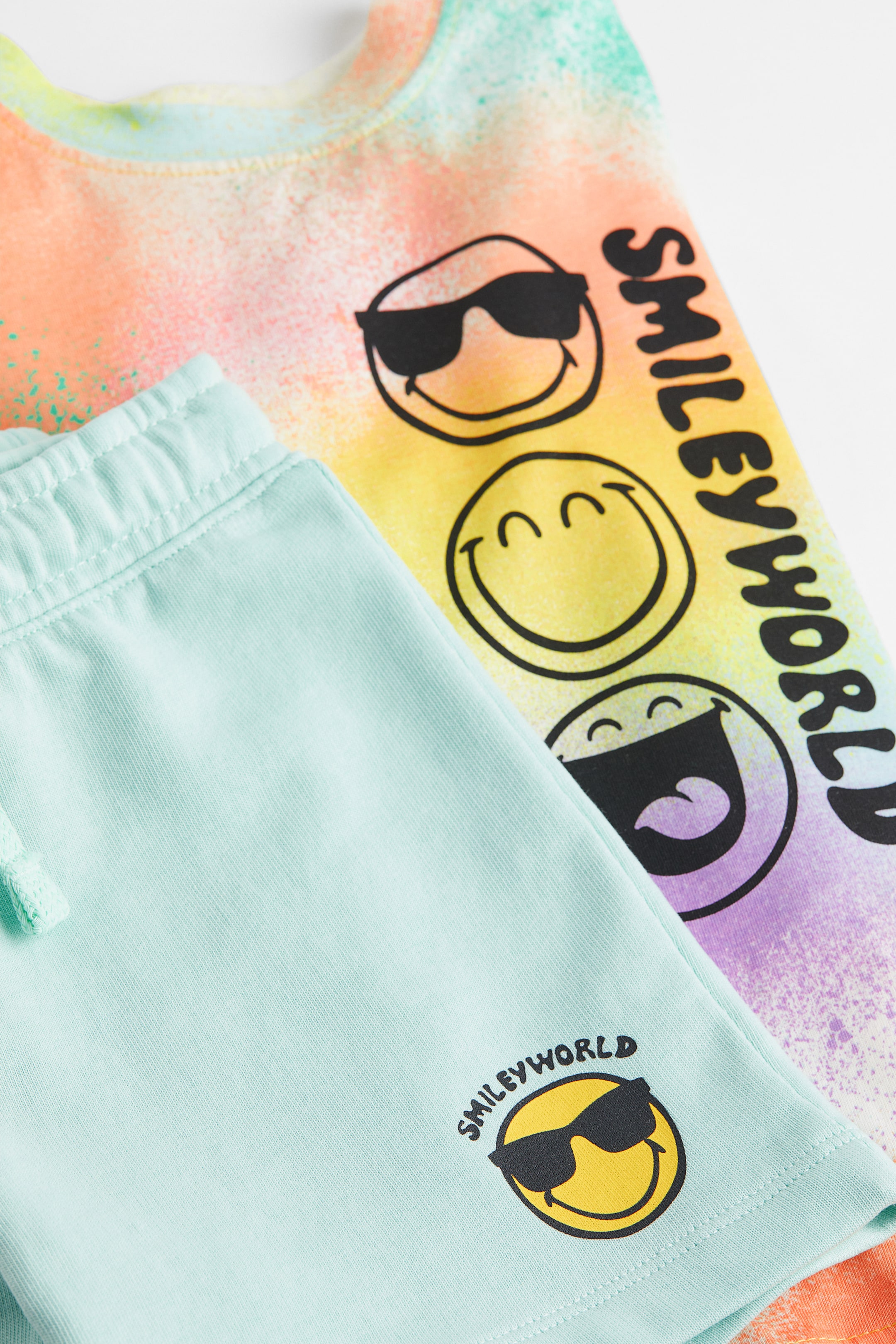 View larger image: 2-piece Printed Set - Light turquoise/SmileyWorld - Kids | H&M US 2