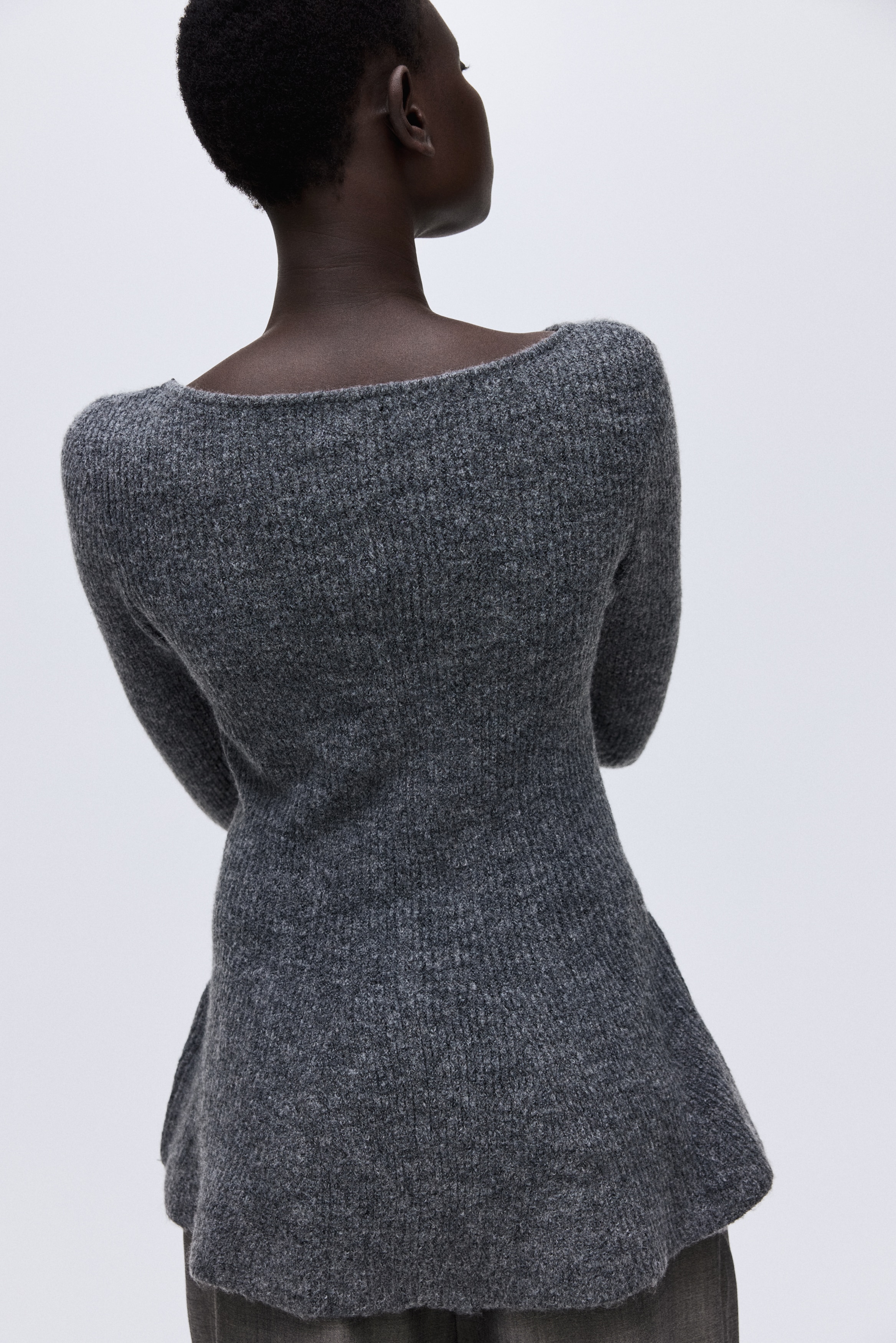 Rib-knit peplum top