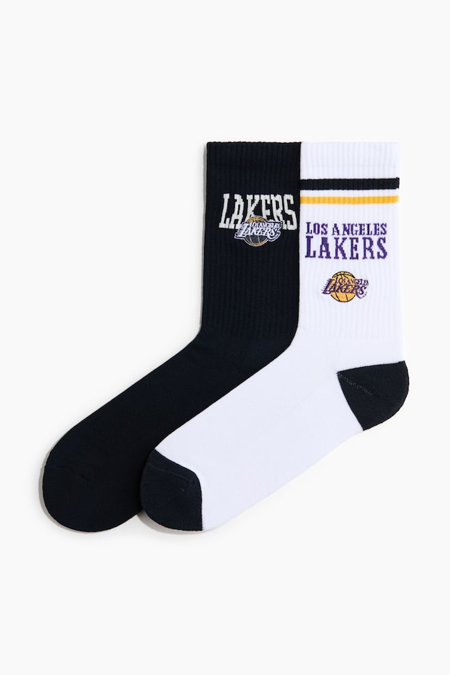 2-pack socks - White/Los Angeles Lakers/White/New York Knicks/White/Beastie Boys/Black/Keith Haring/White/The Simpsons/Purple/The Simpsons/White/Rocky/White/Blue/White/Looney Tunes/Grey/Friday the 13th/Black/Chicago Bulls/Black/Philadelphia 76ers/Black/Coca-Cola/White/Wu-Tang Clan/White/Fight Club/Black/Disney/White/Mickey Mouse/Black/Ford - 1