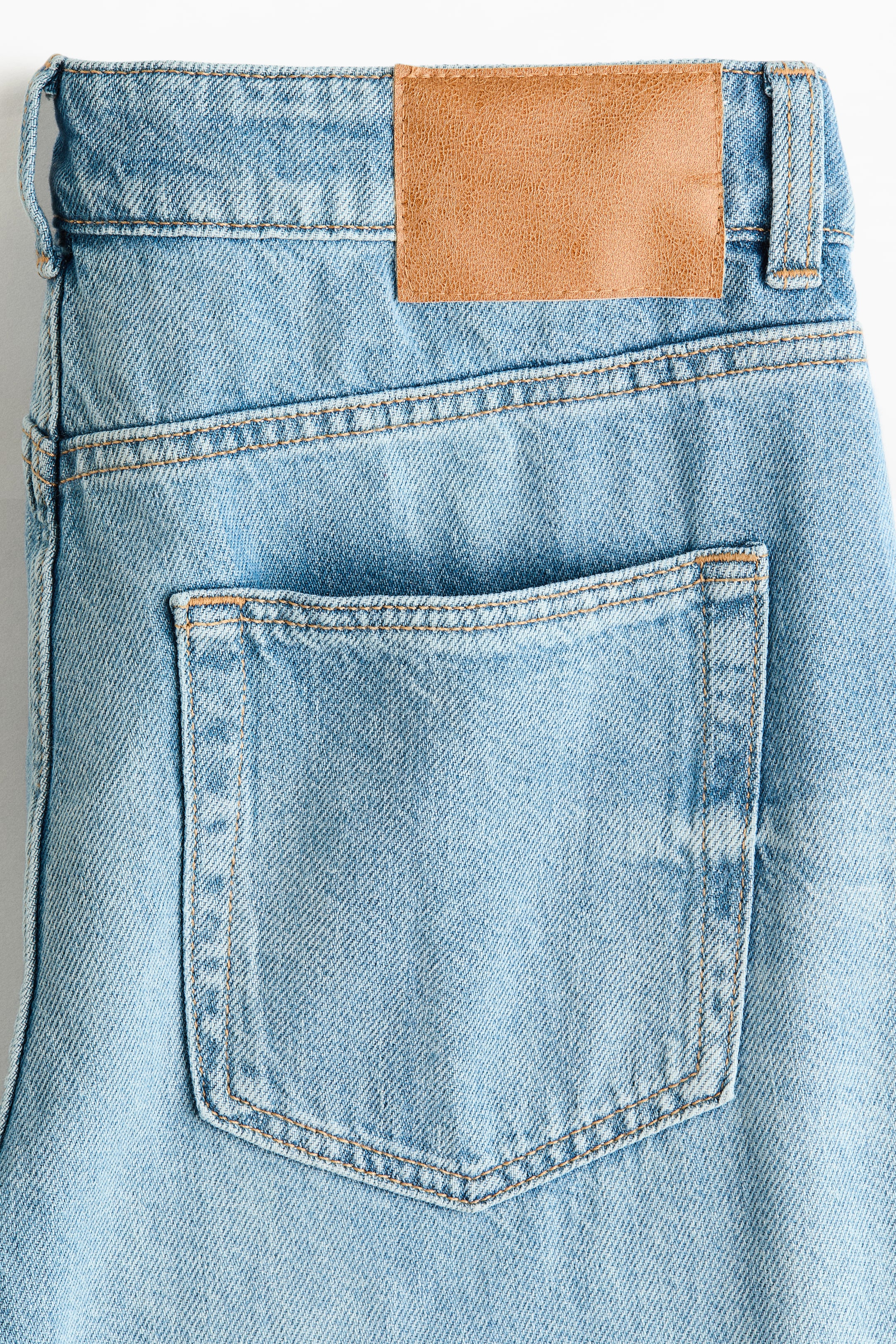 Jean taille haute jambes tonneau
