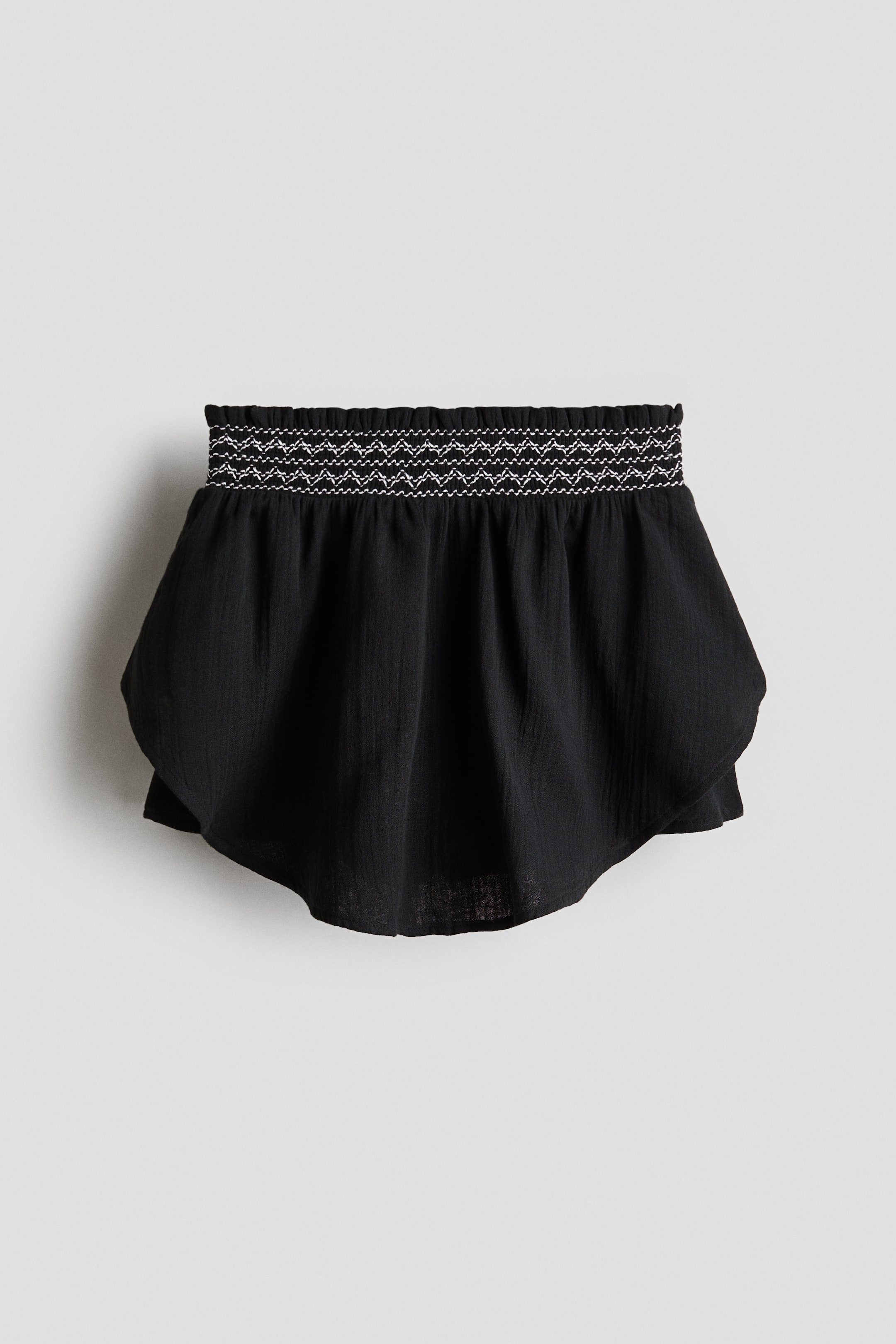 Jupe-short en mousseline avec détail nid d'abeille