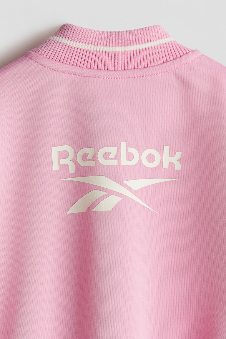 Giacca sportiva con motivo stampato Rosa/Reebok BAMBINO H&M IT