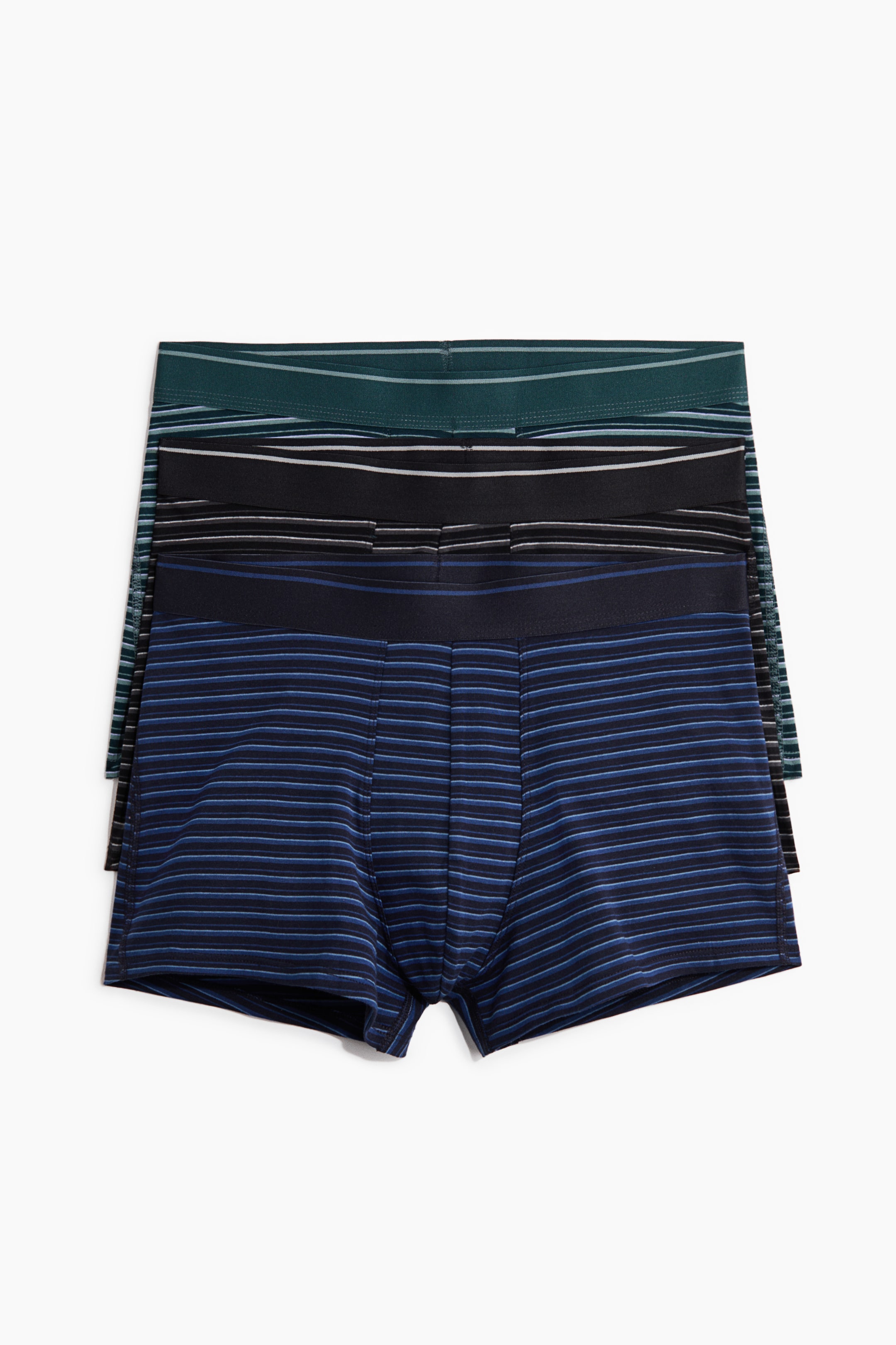View larger image: Three pairs of men's striped boxer briefs are stacked, showcasing their front. The top pair is dark teal, with thin white and light green horizontal stripes and a solid dark teal elastic waistband. The middle pair is black, featuring thin white and gray horizontal stripes and a solid black elastic waistband. The bottom pair is dark blue, with thin lighter blue horizontal stripes, a solid dark blue elastic waistband, and a contoured front panel.