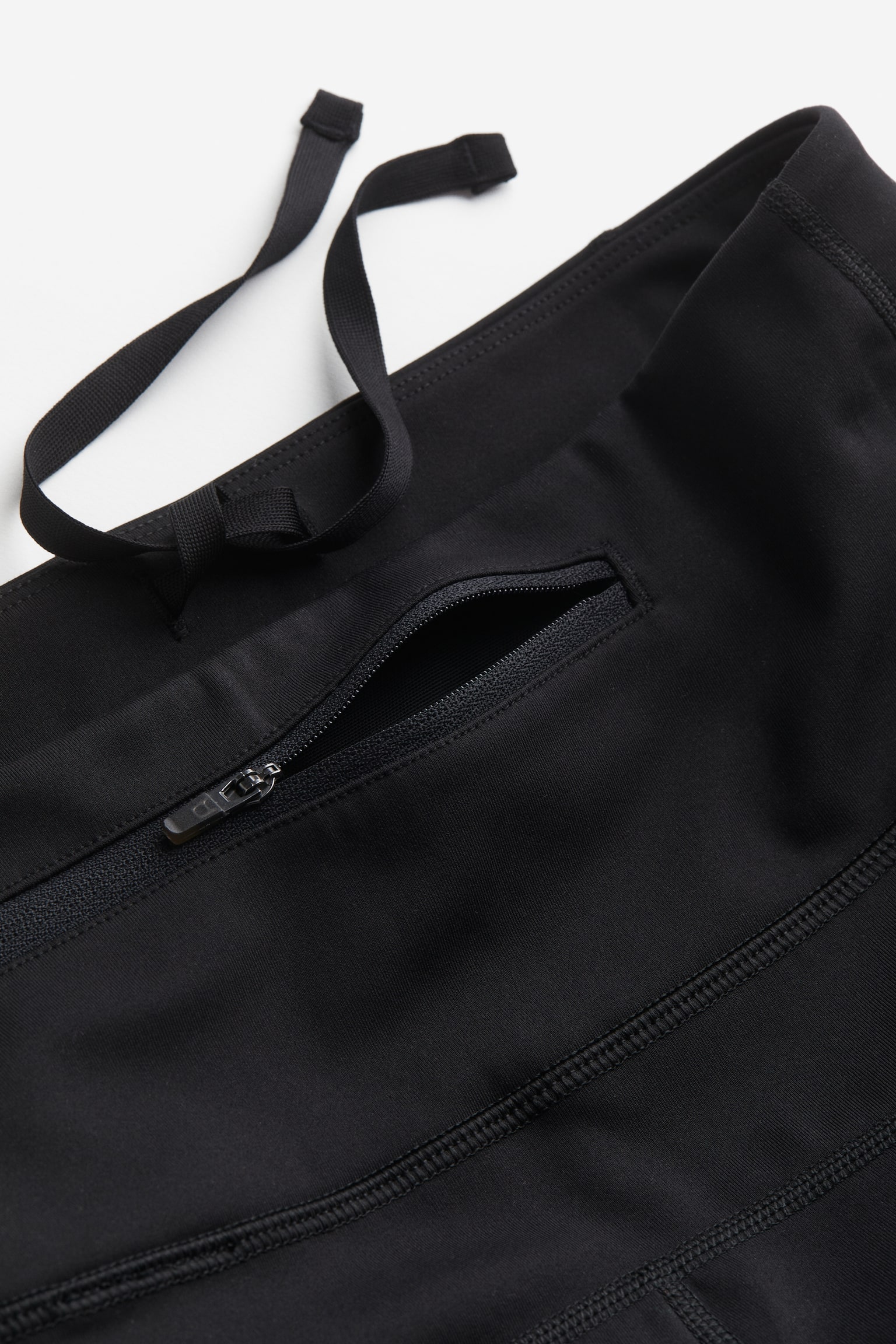 Warm pocket-detail running leggings in DryMove™ - Black - 3