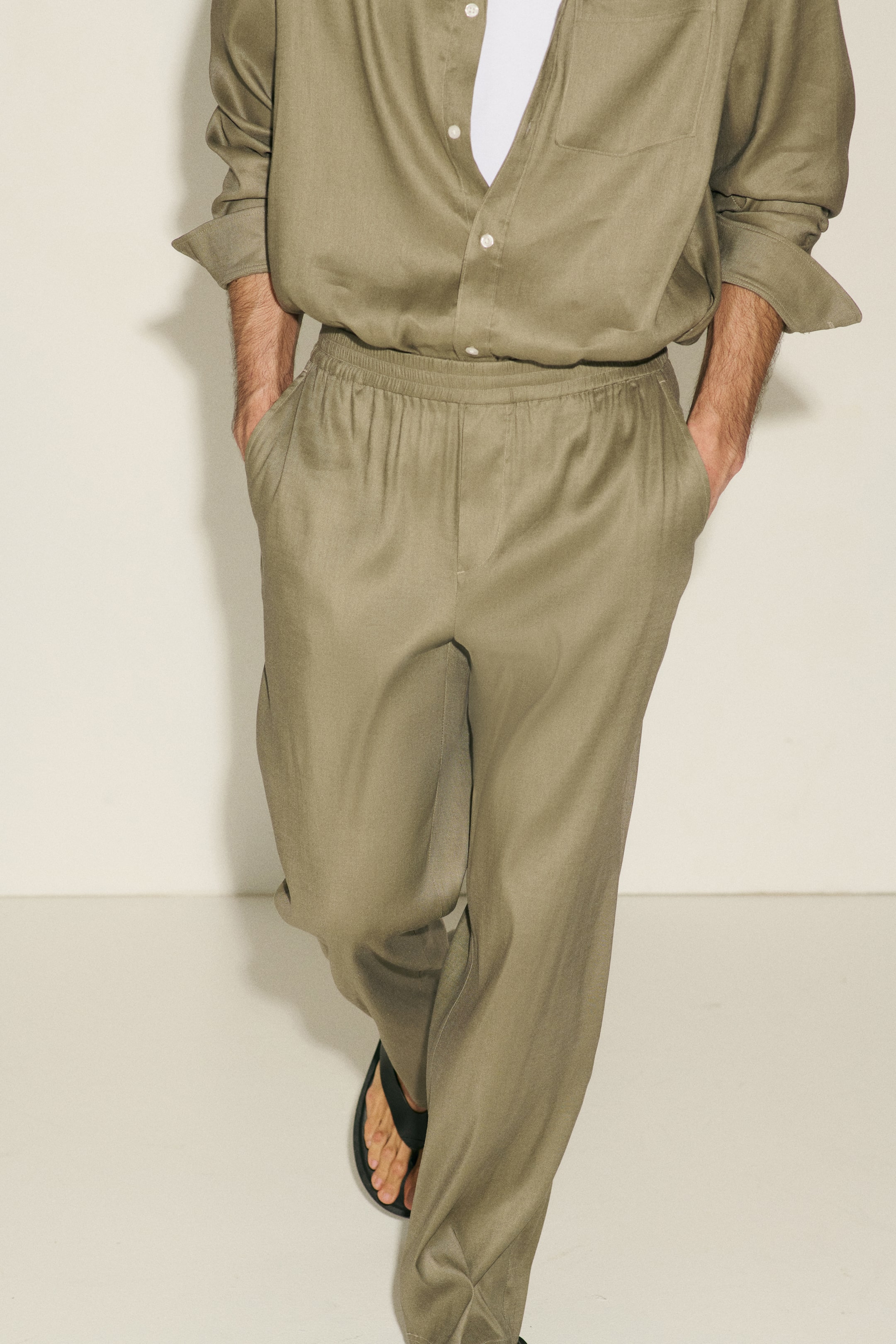 View larger image: Four-way Stretch Loose Fit Linen-blend trousers - Light khaki green - Men | H&M 1