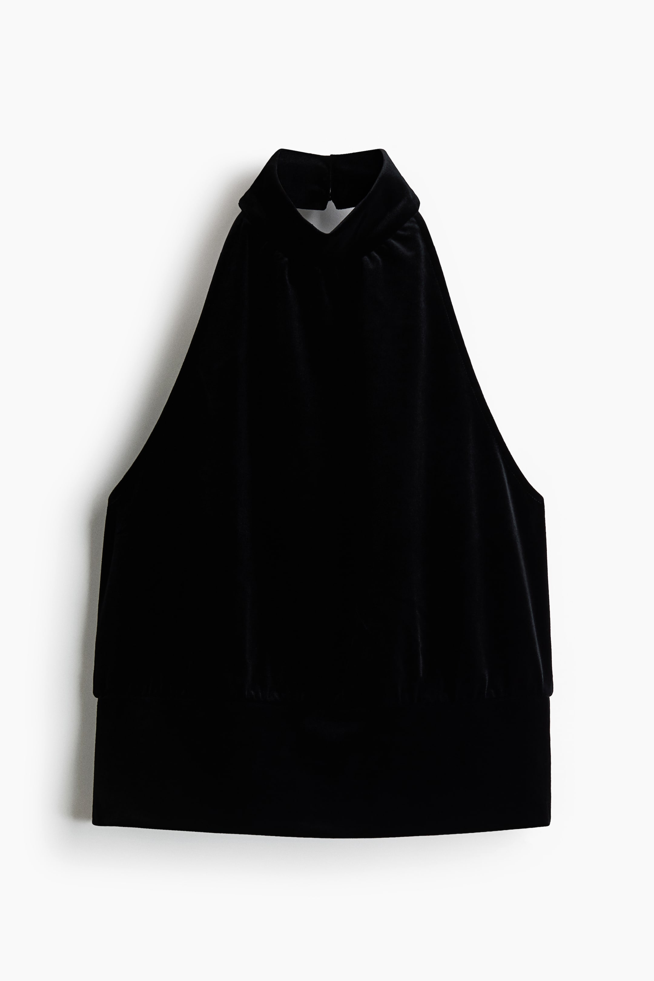 View larger image: A black halterneck top is shown from the front, featuring a soft, plush texture with a high, gathered neckline. The sleeveless design tapers down to a wide, fitted waistband with subtle gathers along its top edge.