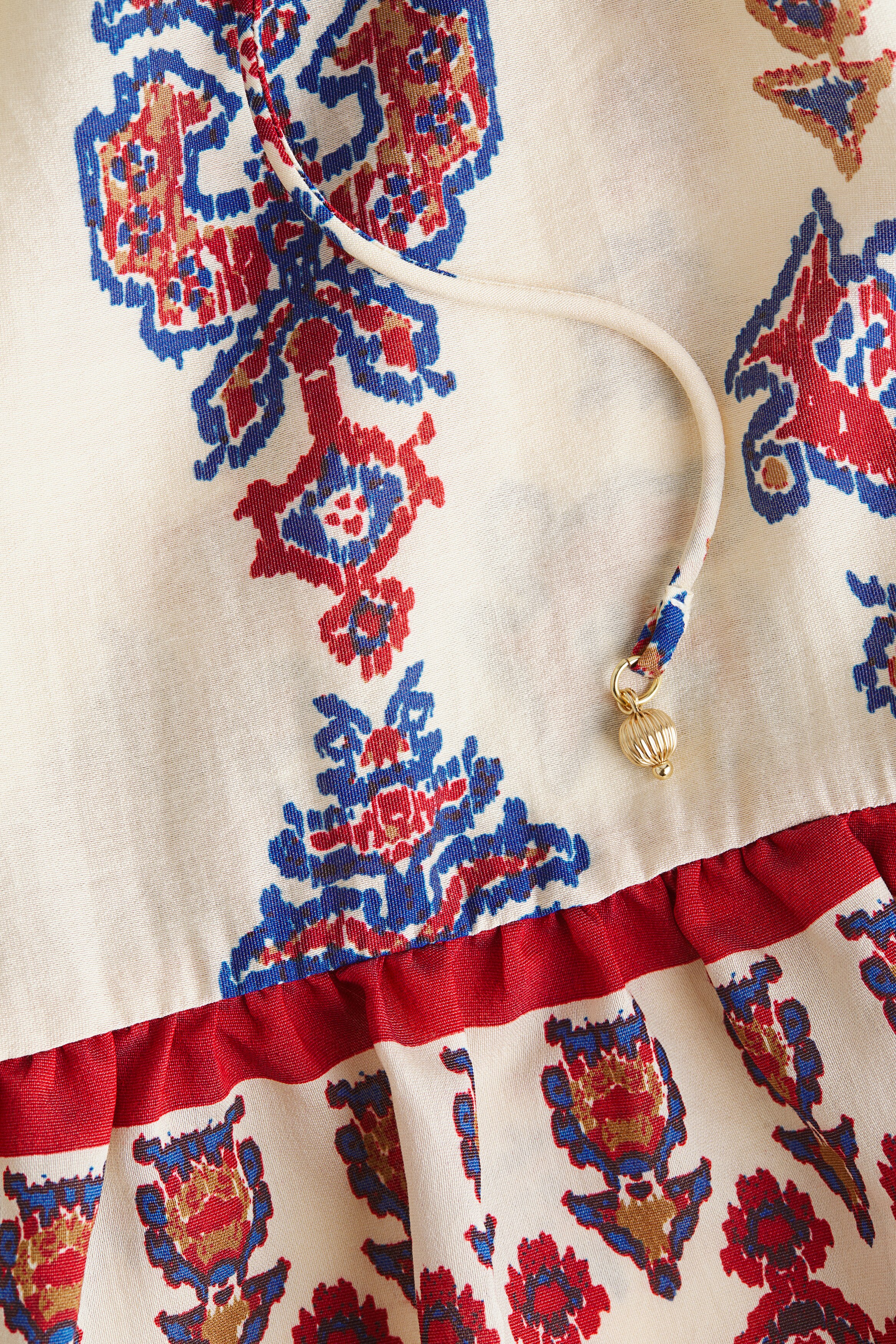 Flounce-trimmed blouse