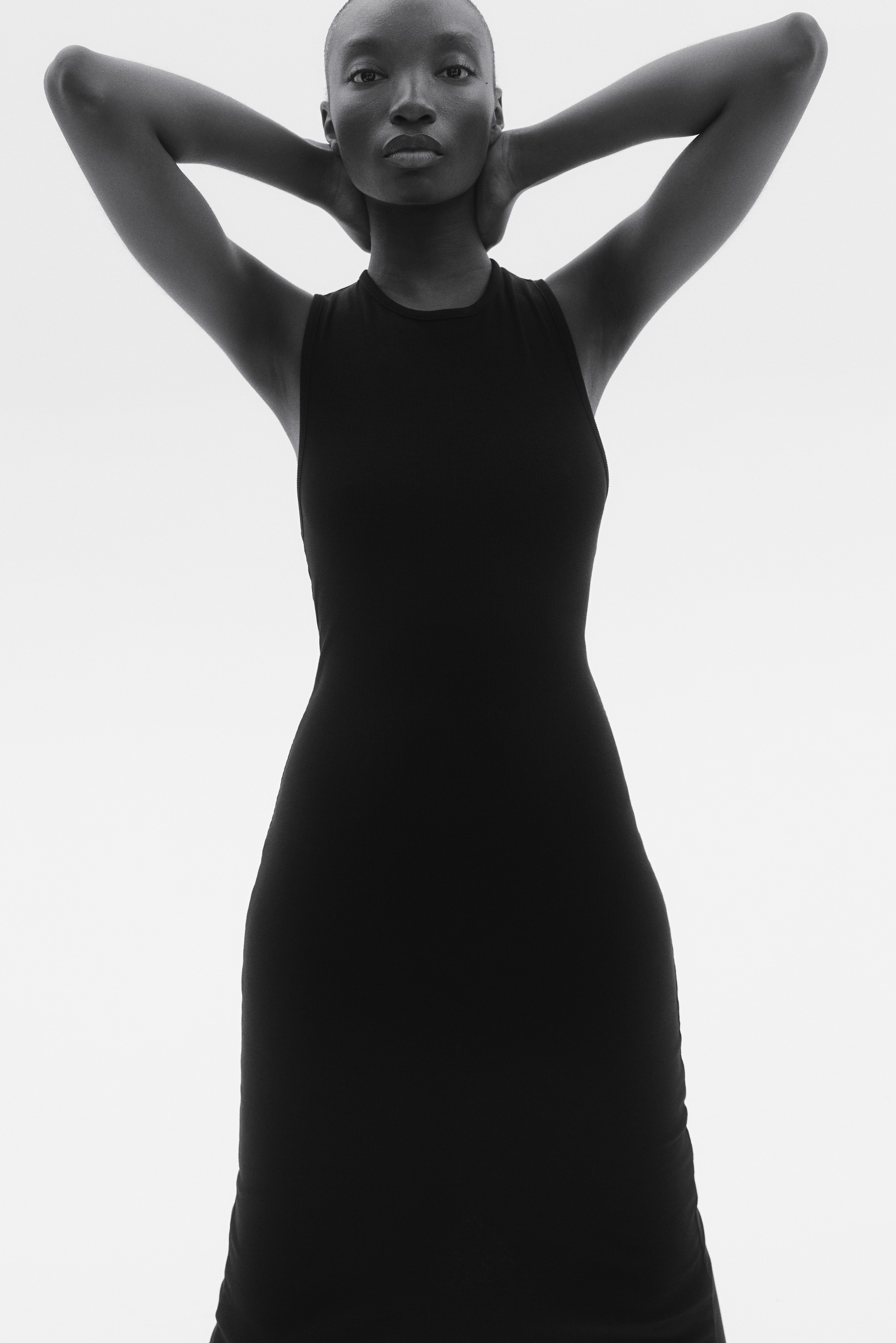 h&m rib knit dress black H&M Flounced Rib-Knit Dress in Black
