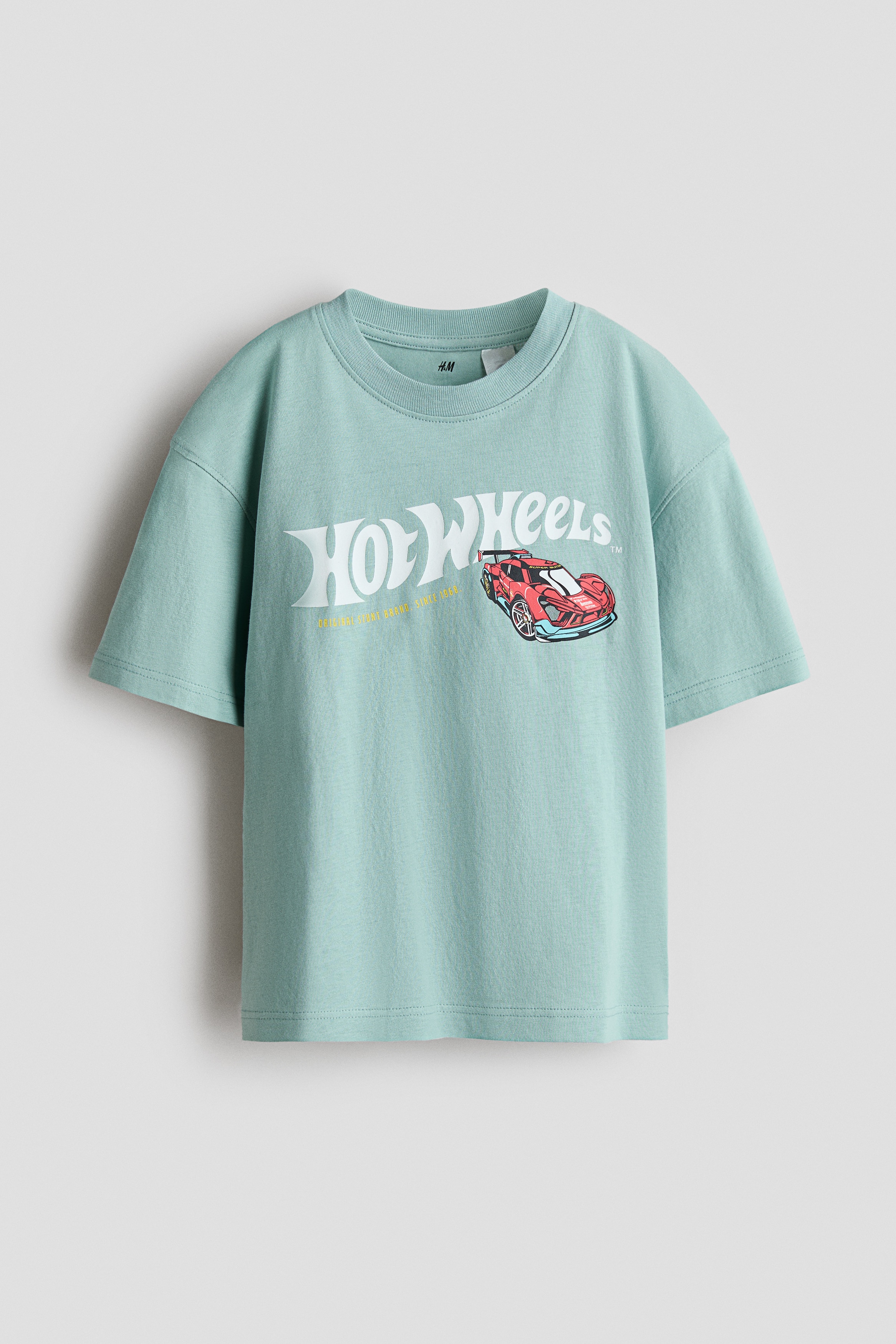 オーバーサイズ プリントTシャツ - ライトターコイズ／ホットウィール