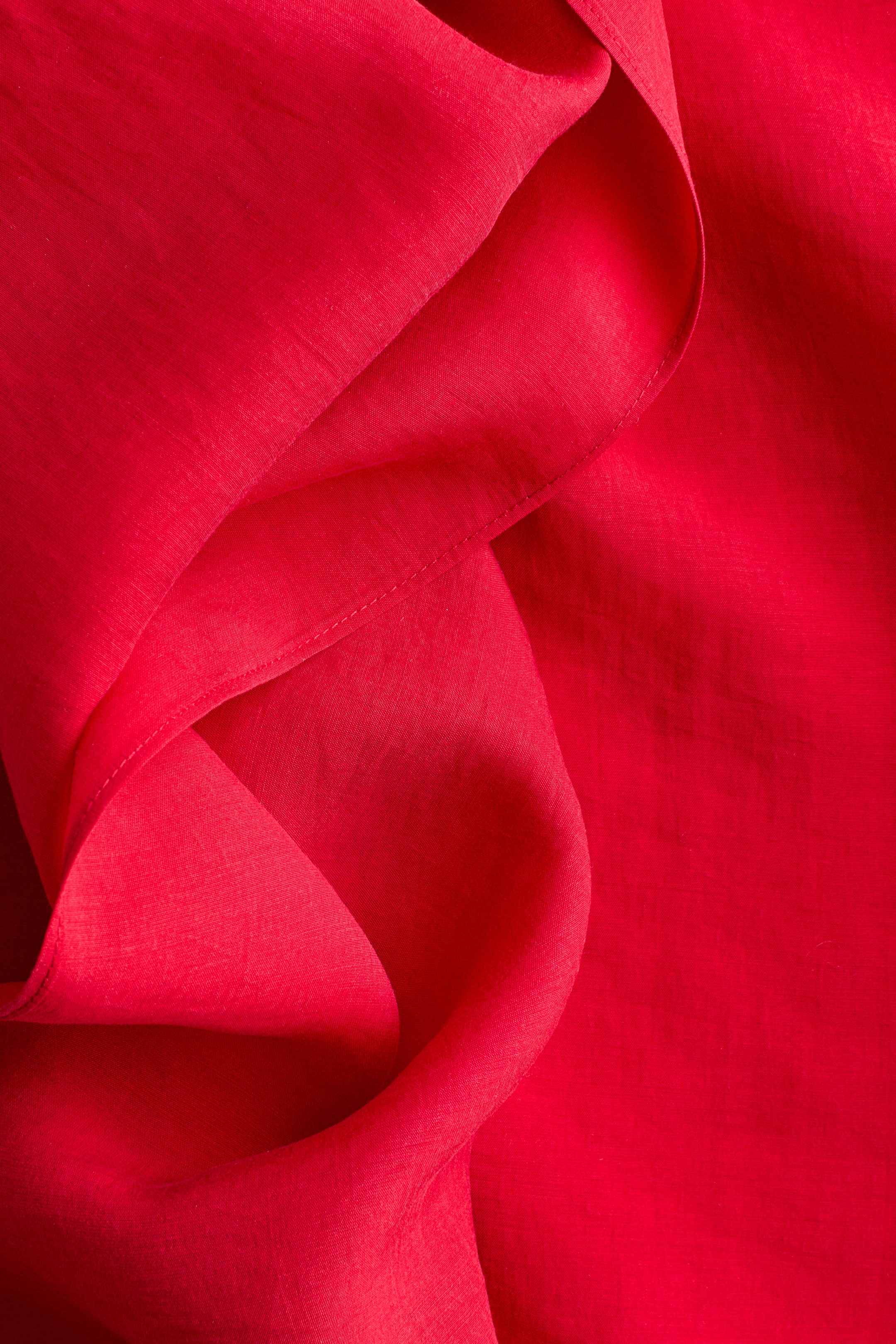 Blouse sans manches avec col écharpe