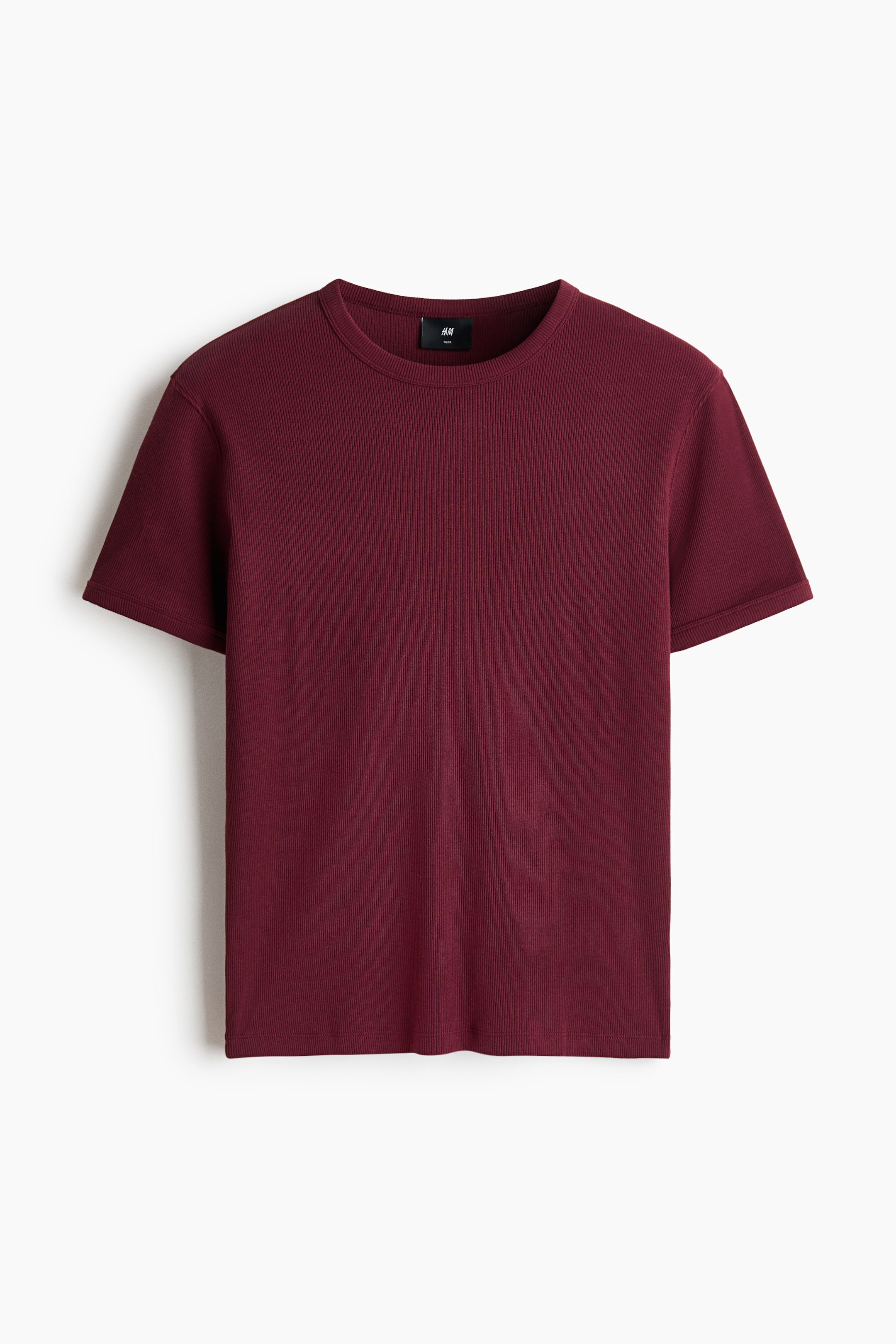 View larger image: The T-shirt in a rich red hue is showcased in its frontal perspective. Crafted from ribbed cotton jersey, it boasts a round neckline, short sleeves, and a straight-cut hem, offering a sleek, tailored fit.