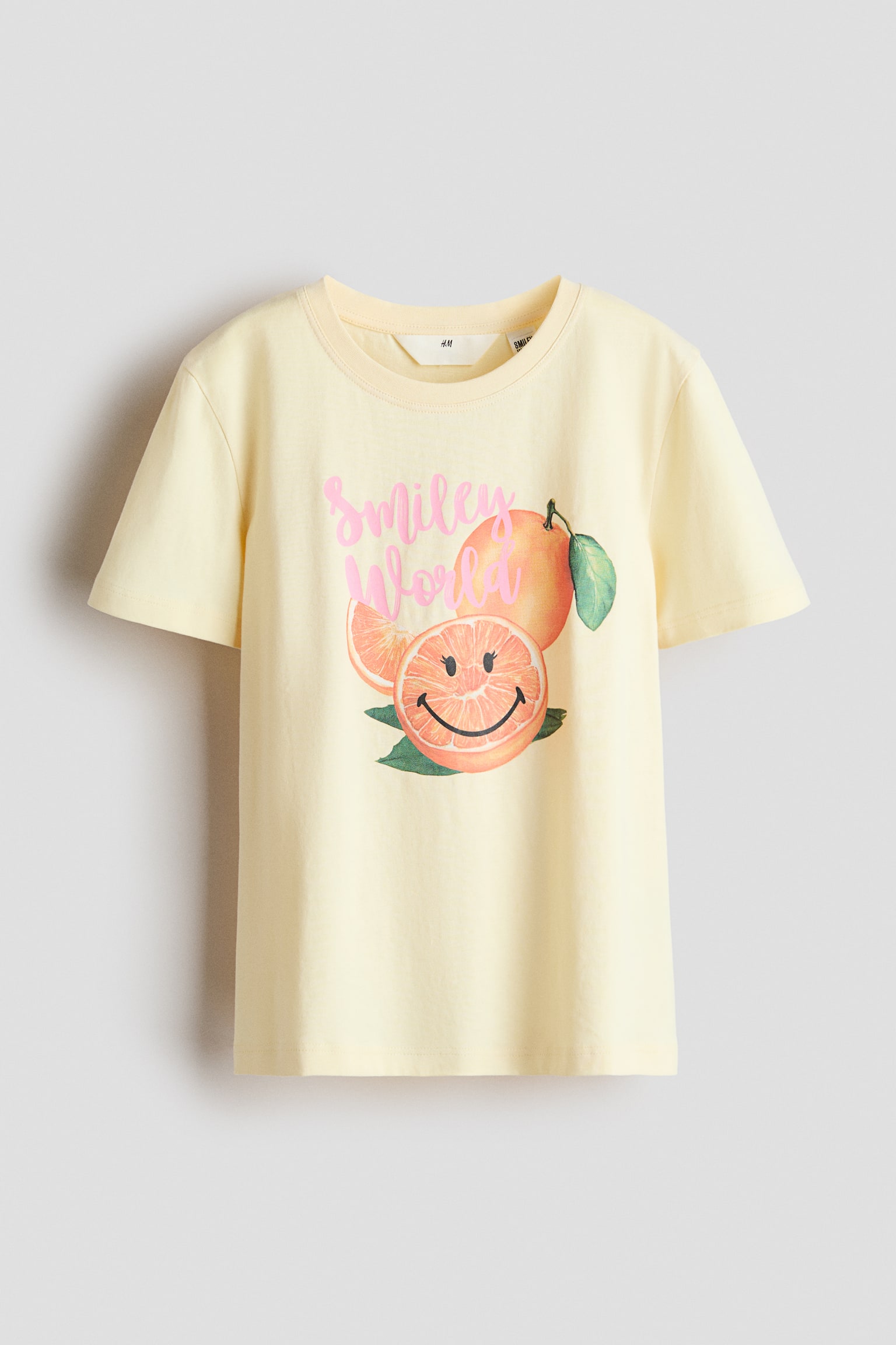 T-shirt i bomuld med trykt motiv - Gul/SmileyWorld®