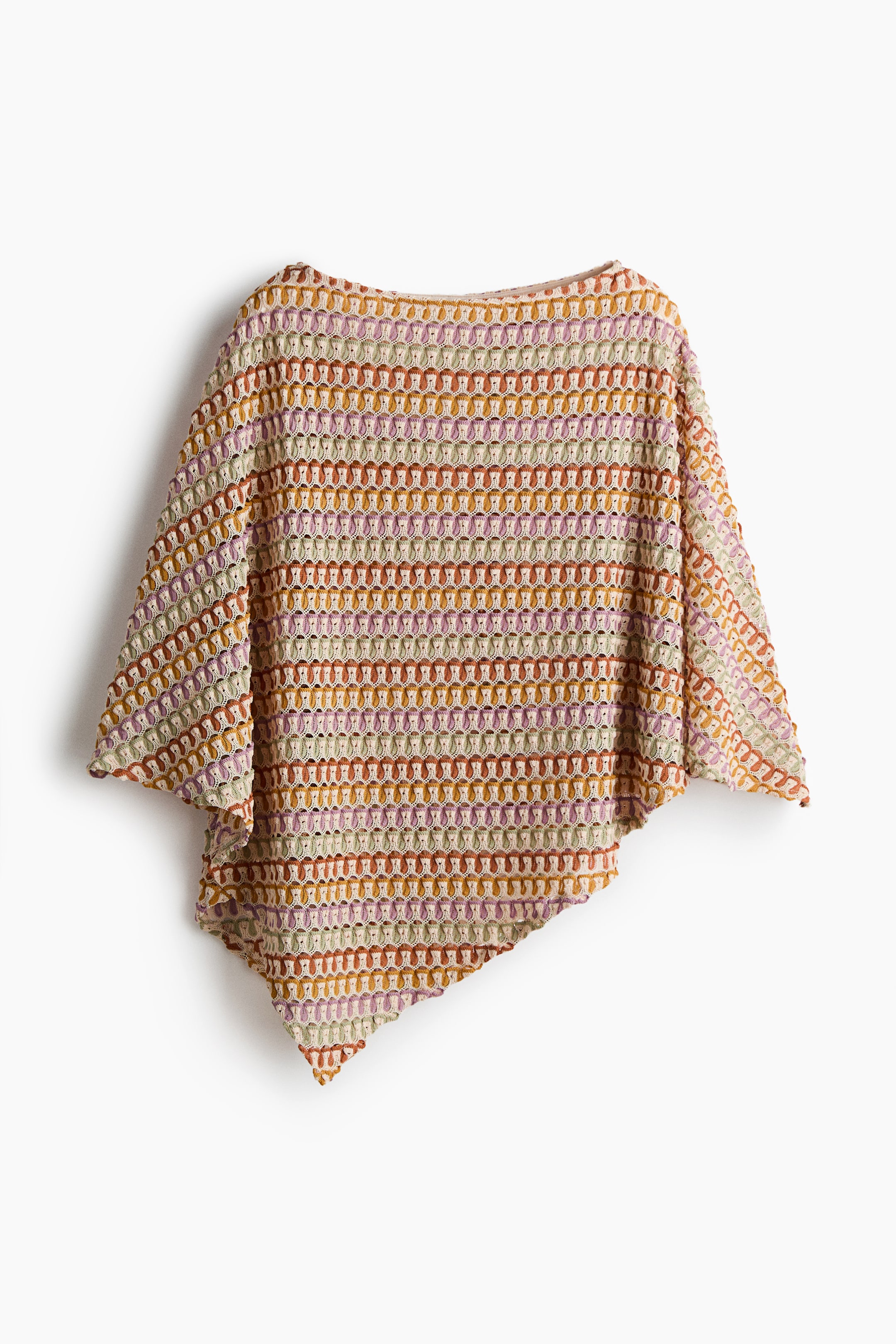 View larger image: A multicoloured knit poncho is presented FRONT, displaying a wide boat-neck and an asymmetrical hemline. An open crochet pattern forms horizontal stripes in beige, orange, brown, purple and green.