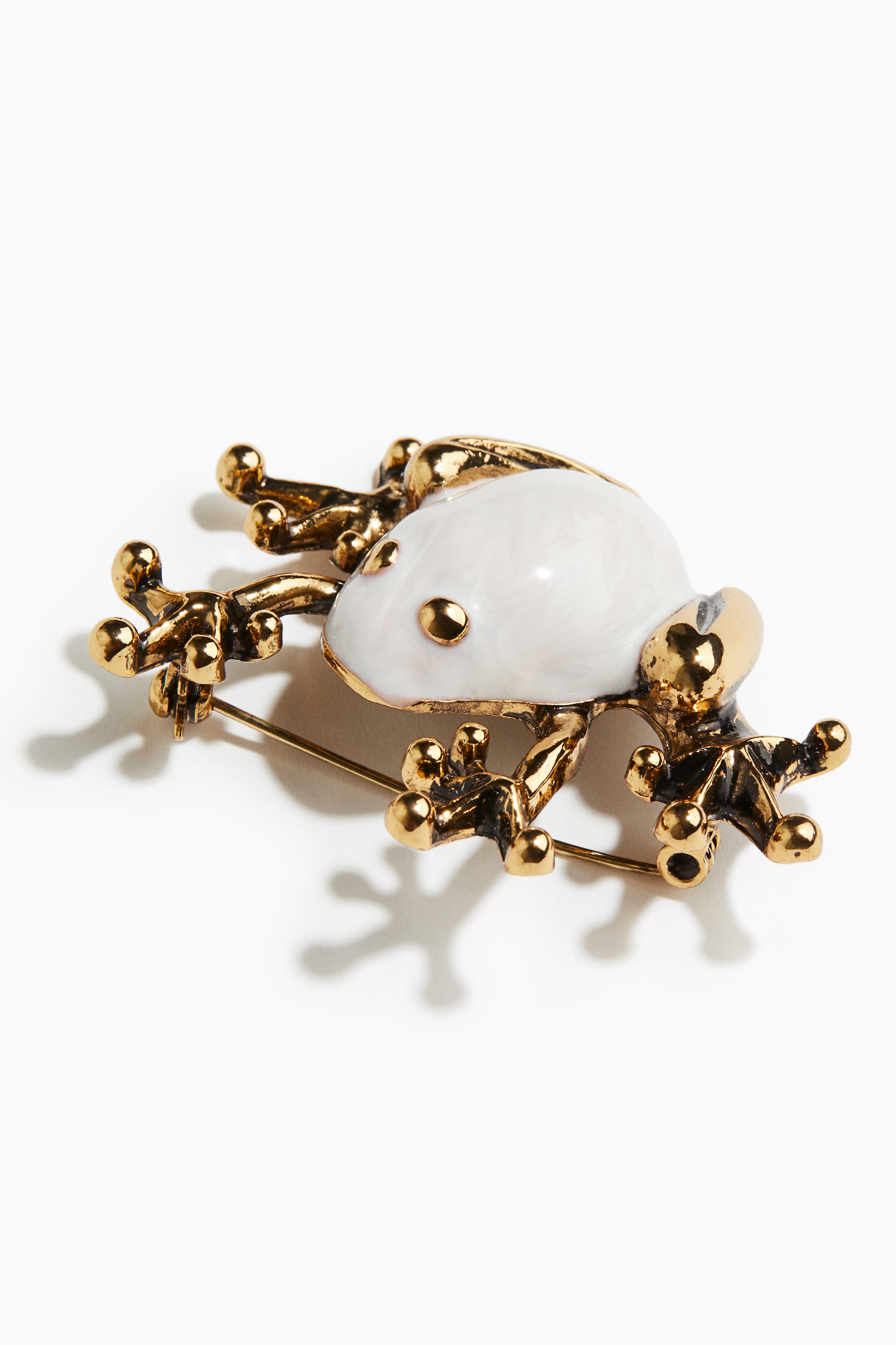 美品 ゴールドツイストロゴブローチ フロッグブローチ - ゴールドカラー - レディース | H&M JP