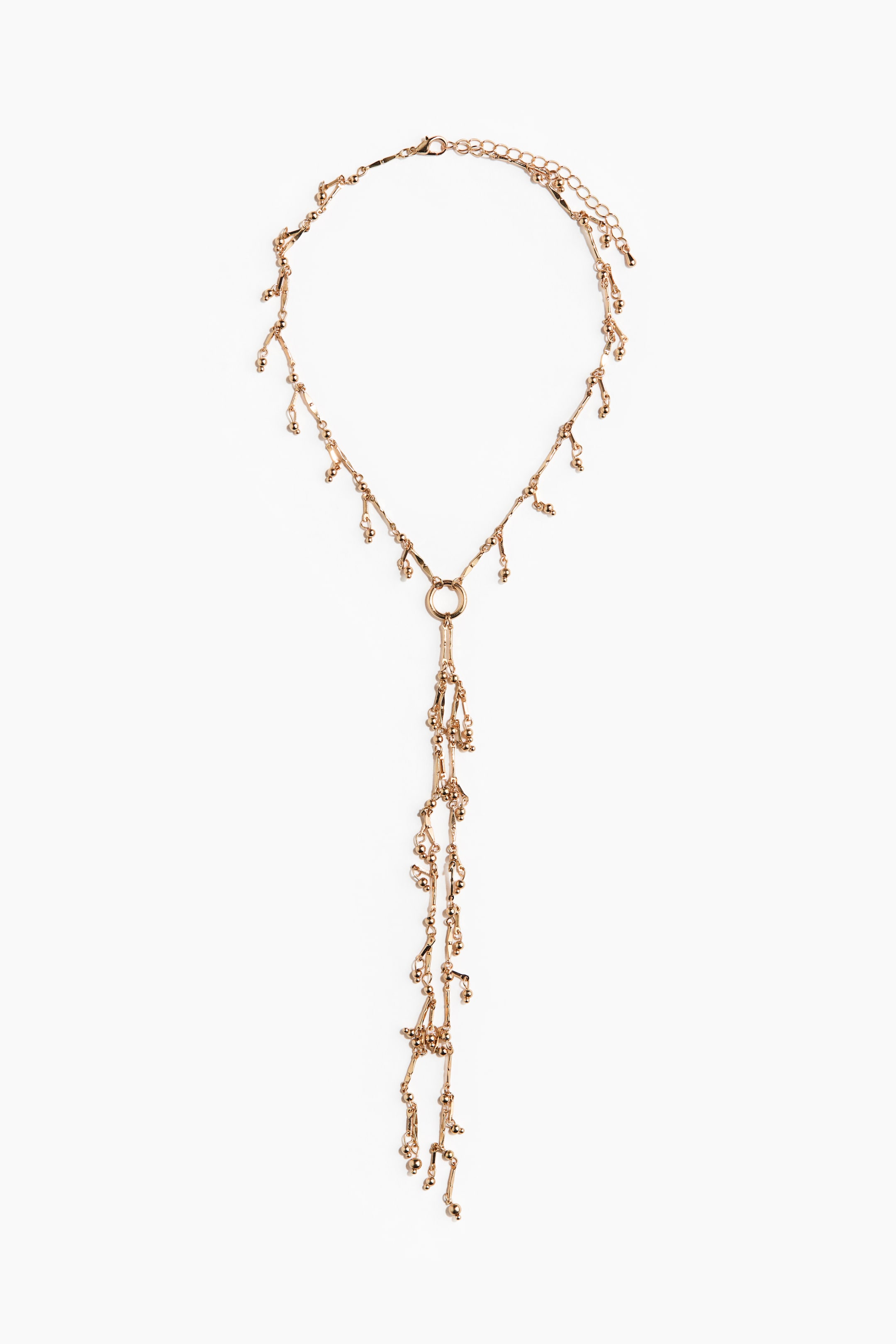 Agrandir l'image: Un collier en forme de Y est orienté vers l'avant, avec une chaîne en métal étroite ornée de petits amas de perles suspendues tout au long. Plusieurs brins perlés s'étendent à partir d'un anneau central, formant sa forme en Y, et il comprend une longueur ajustable avec un fermoir à déclenchement.