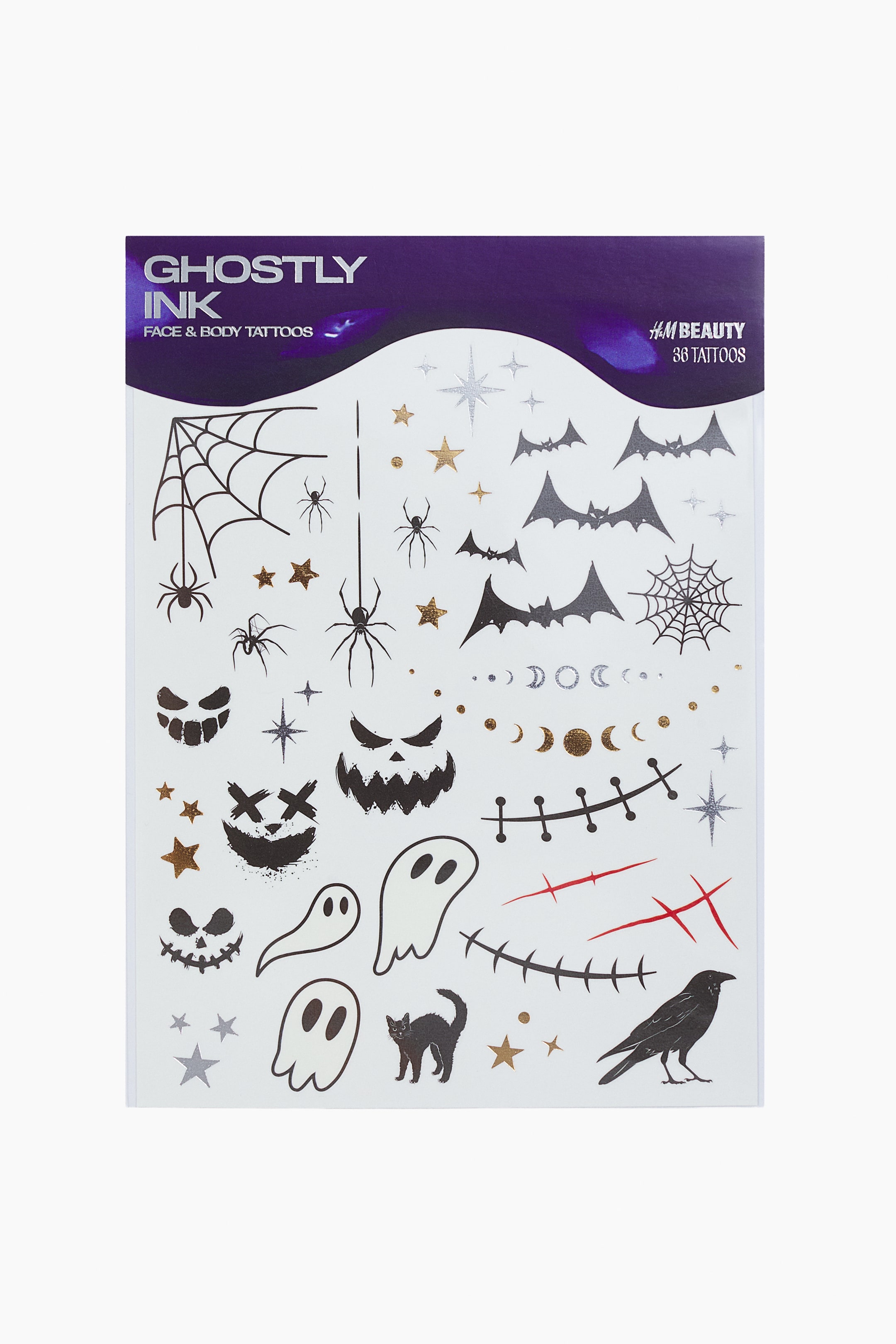 View larger image: A front view of a sheet of 36 temporary tattoos displaying various spooky designs in black, white, red, gold and silver. The sheet features illustrations of spiders, spiderwebs, bats, ghosts, jack-o'-lanterns, stars, moons, scars, a black cat and a raven, all in varying sizes.