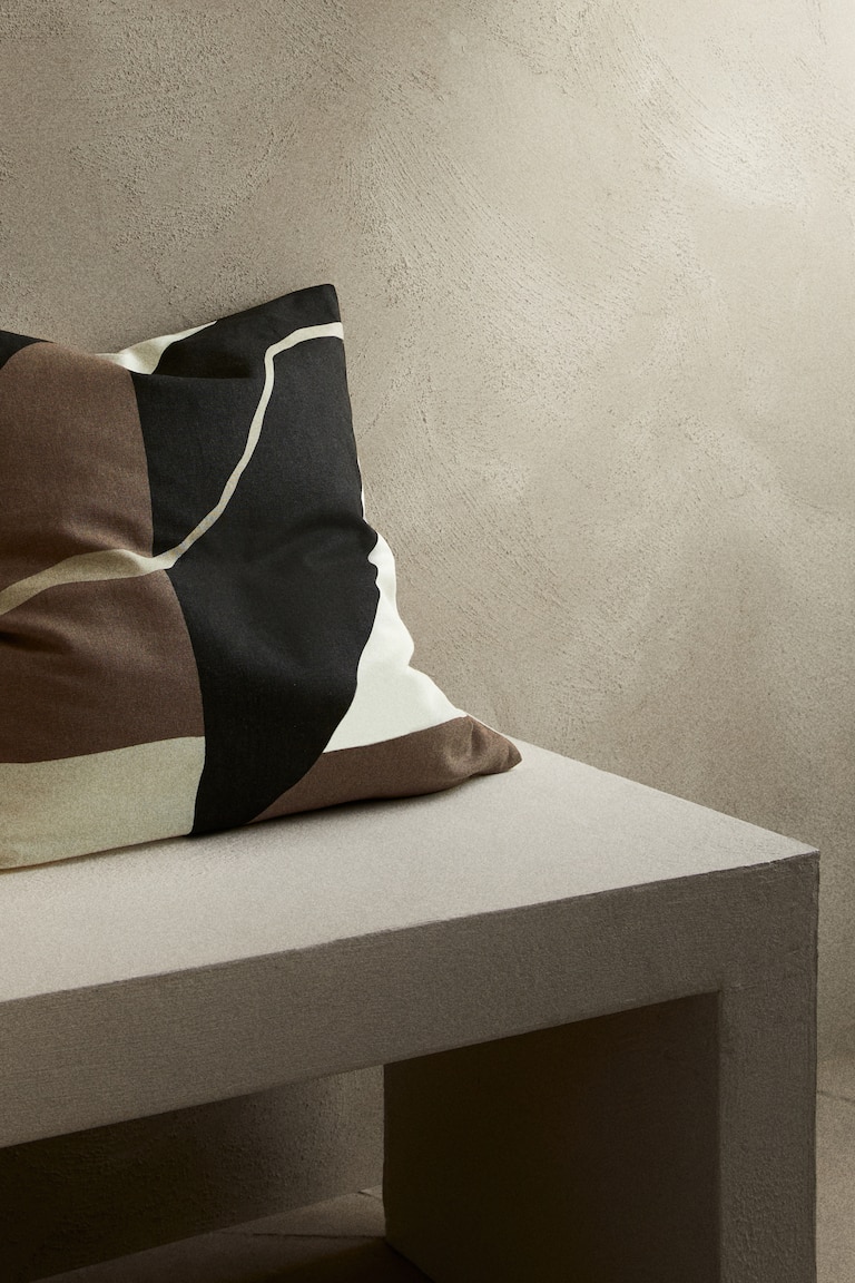 Housse de coussin à motif