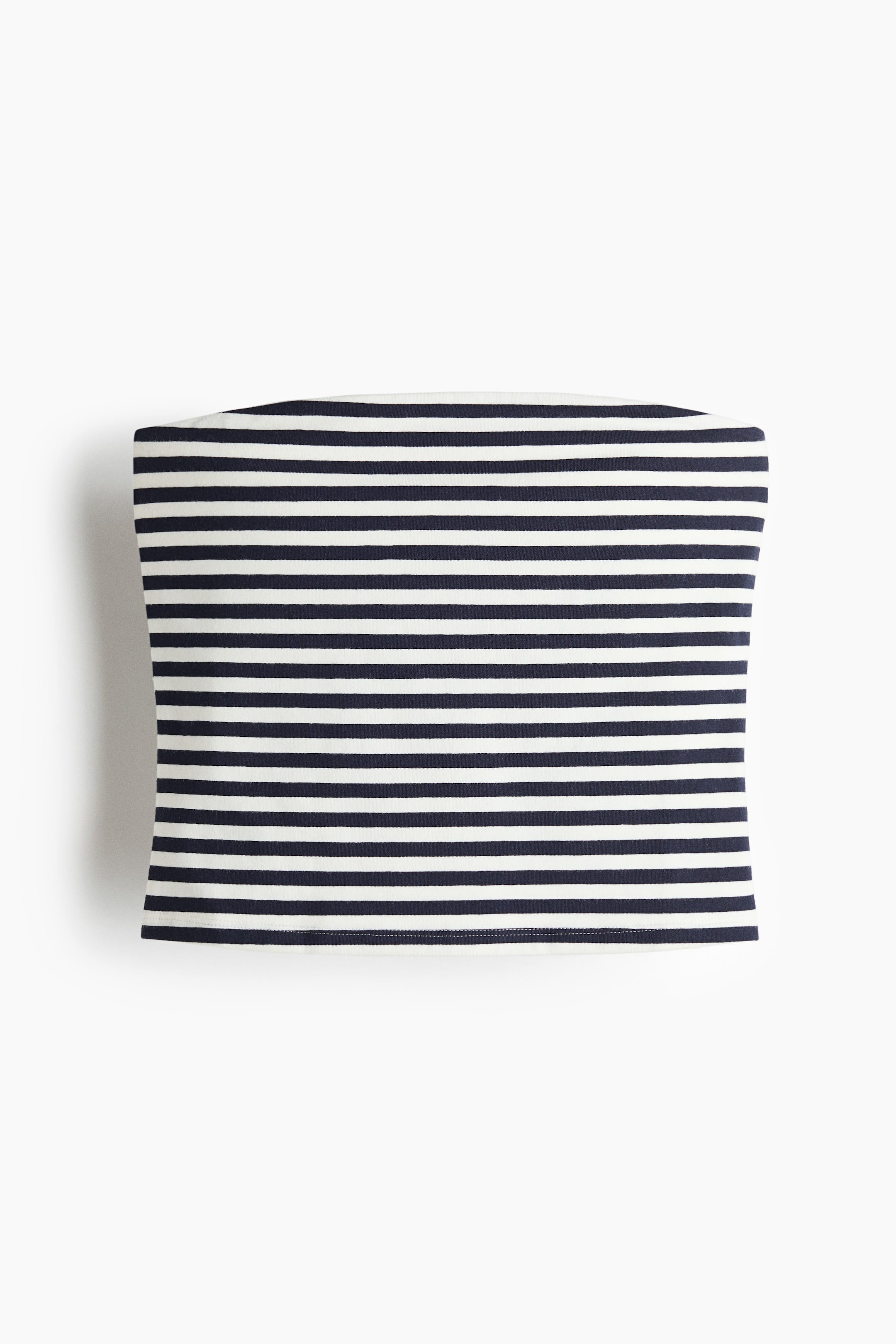 View larger image: The strapless top features horizontal navy blue and off-white stripes, laid flat with its front facing upwards.