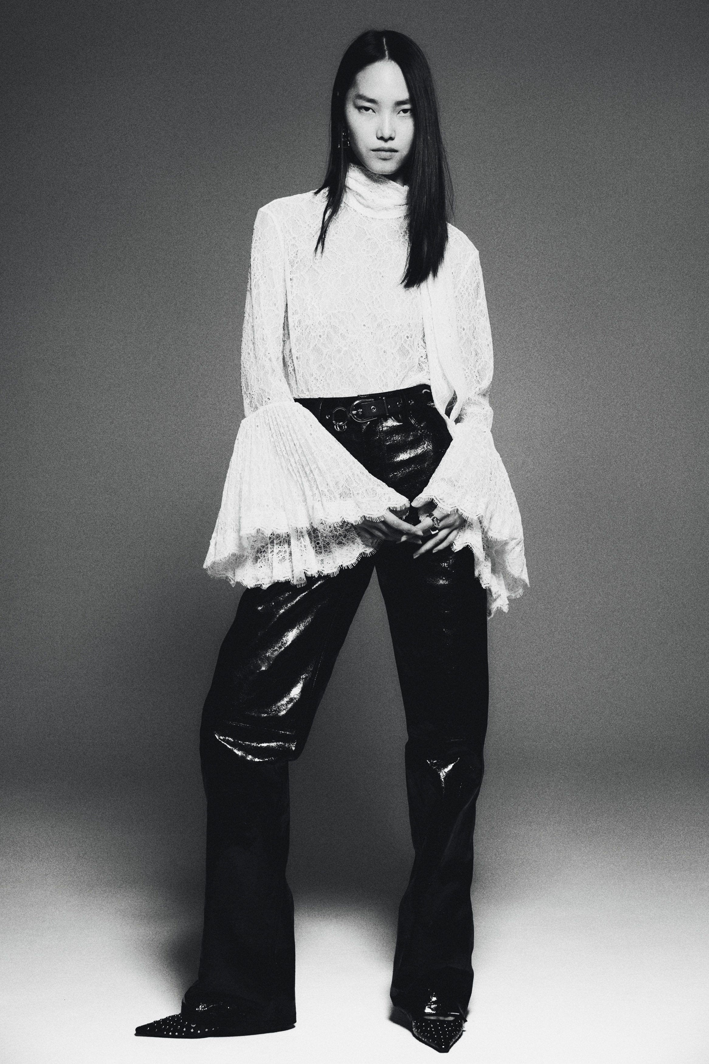 Trumpet-sleeved lace blouse