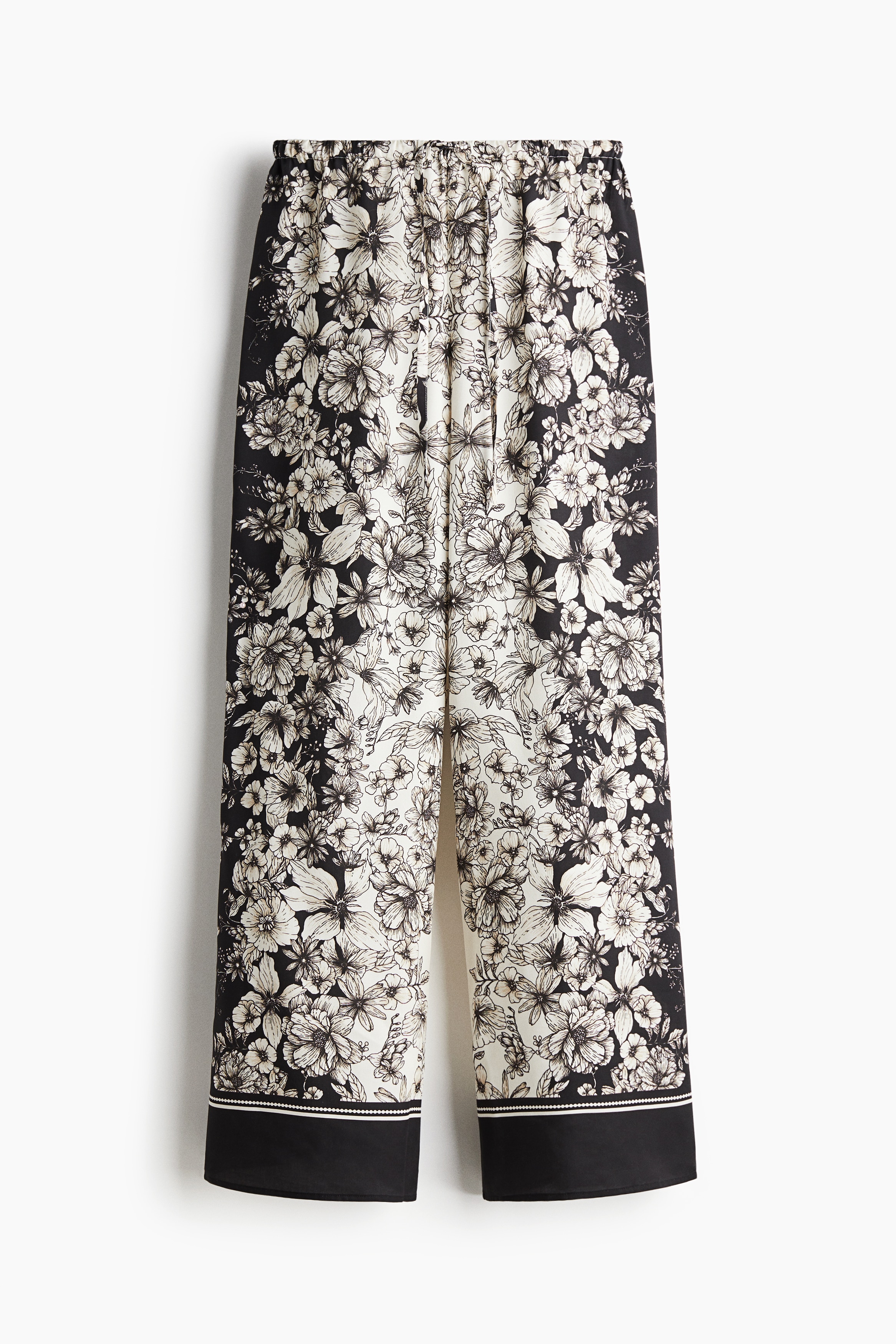 Pantaloni con coulisse e stampa - Nero/fiori/Crema/fiori