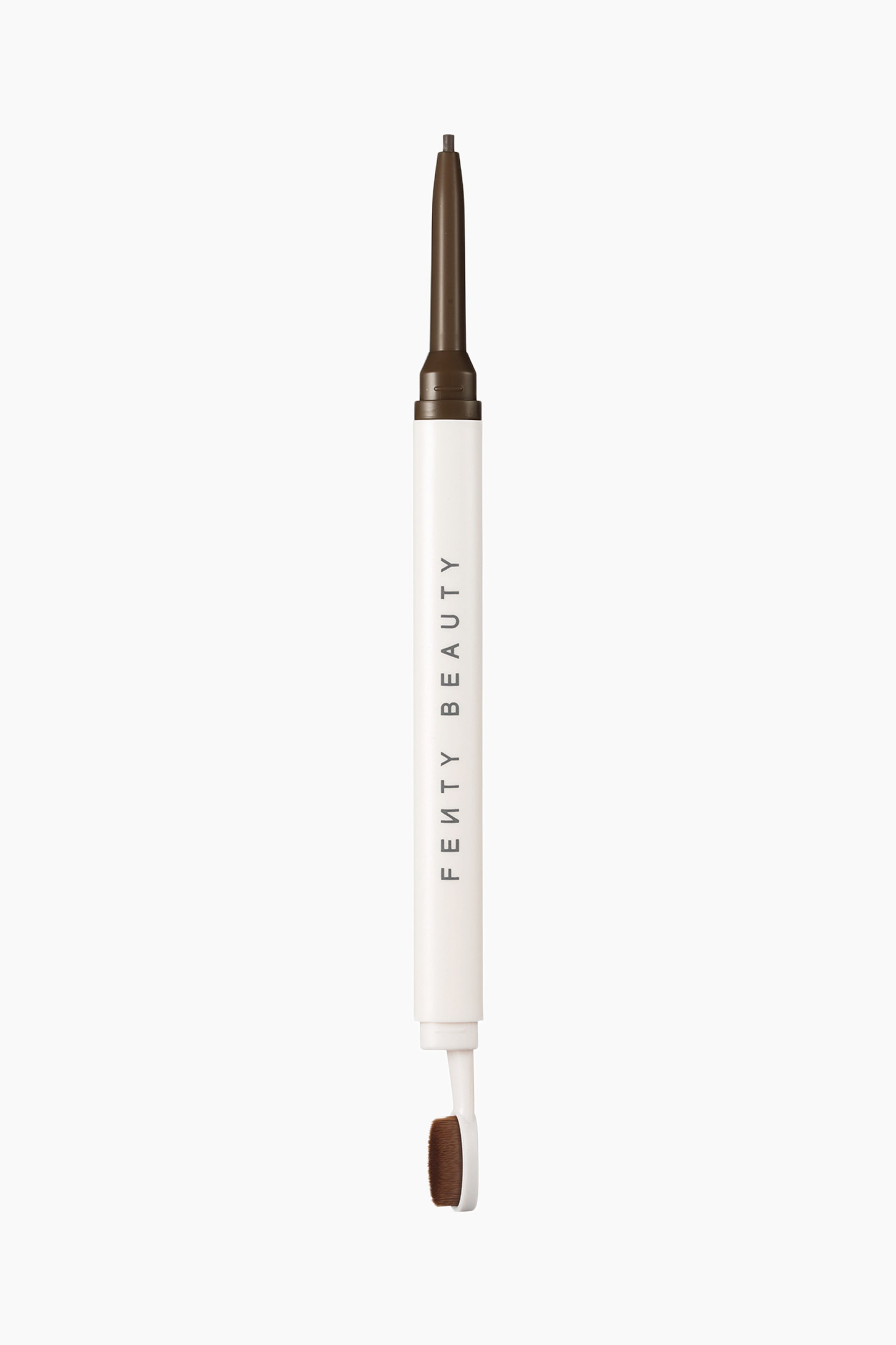 Visa större bild: The Brow Mvp Ultra Fine Brow Pencil & Styler står vertikalt och visar upp en dubbelsidig design med ett vitt cylindriskt skaft. Ena änden visar en utdragen, fin mörkbrun pennspets, medan den andra änden har en liten stylingborste i paddelstil med täta bruna borst.