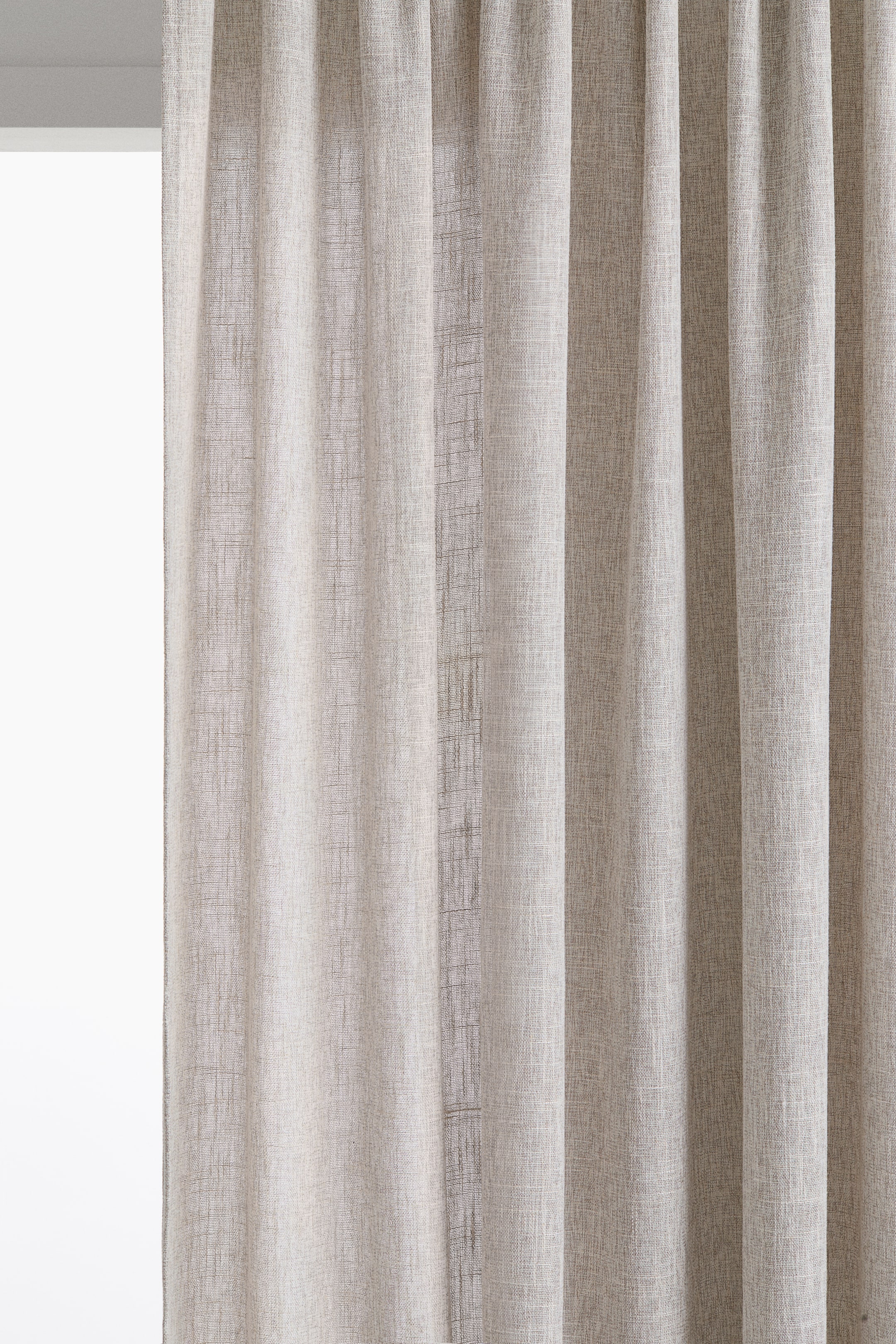 View larger image: The extra-long, wide curtain panel features a semi-sheer, textured weave with subtle character and natural variations. It hangs in soft, vertical folds from a gathered multiway header, allowing some light to filter through.