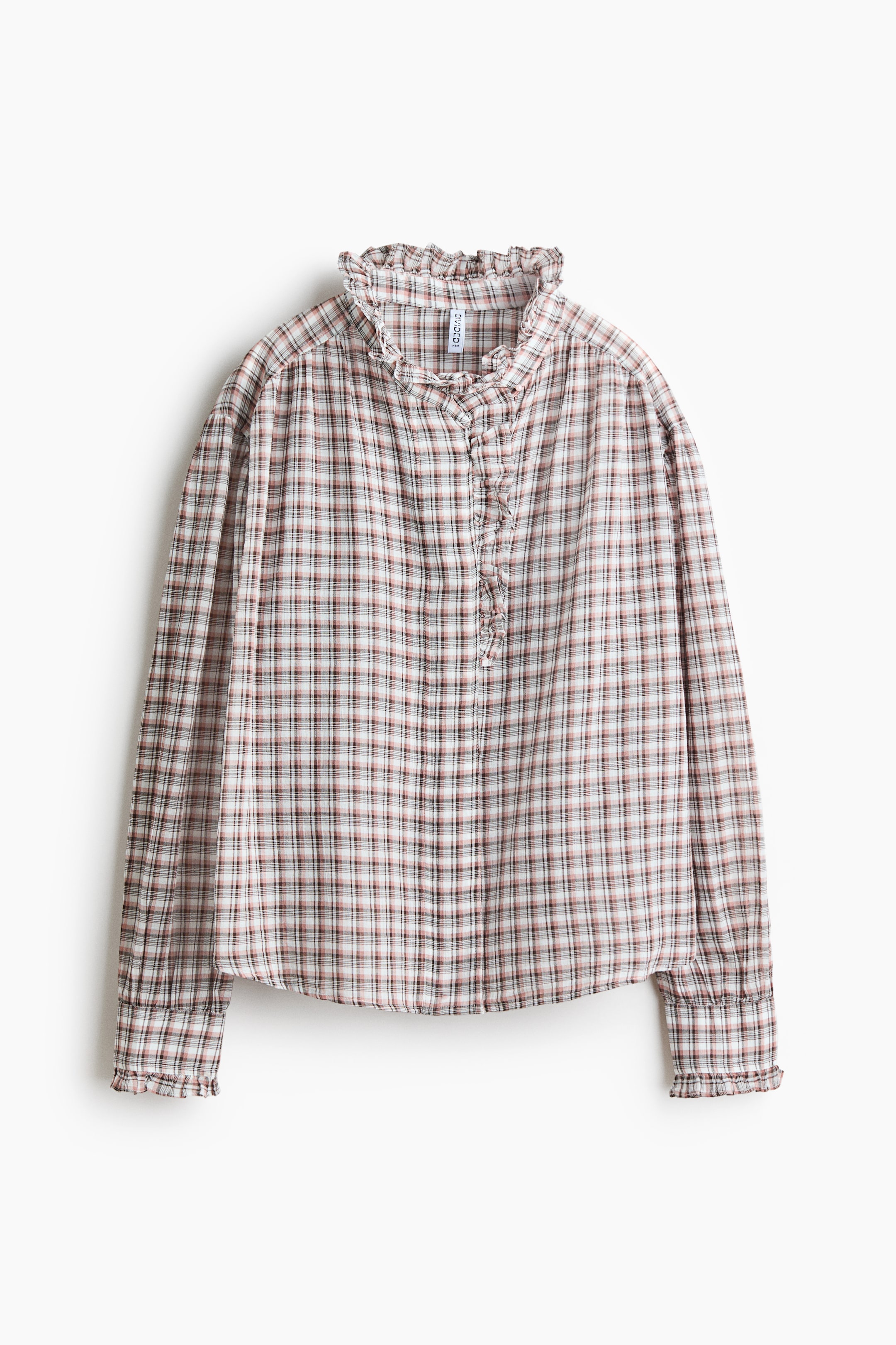 View larger image: A checkered blouse showcasing a ruffled high collar and a partially ruffled placket adorned with small buttons. It boasts long sleeves with ruffled cuffs.