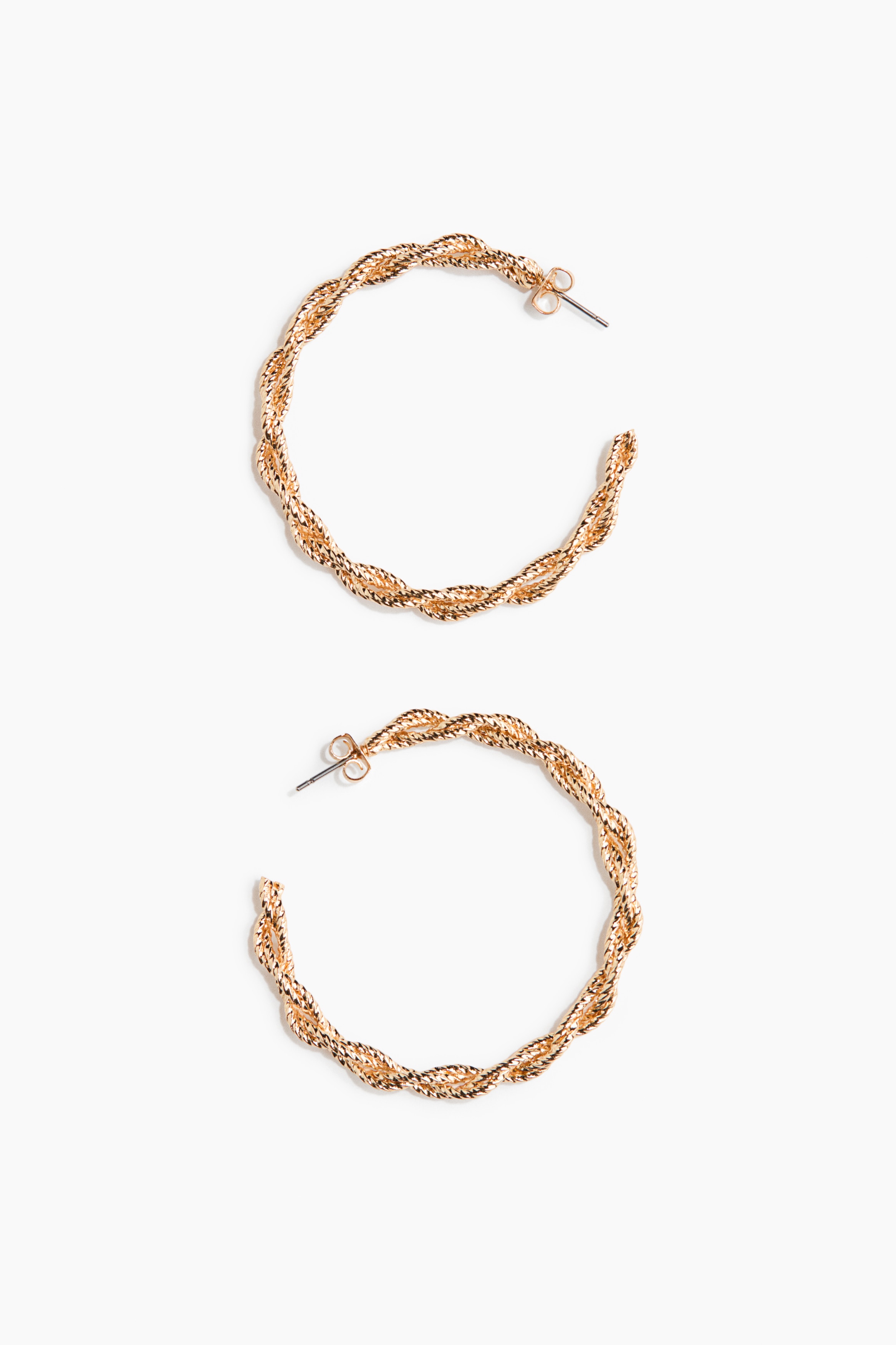 Twisted hoop earrings - ゴールドカラー - レディース | H&M JP