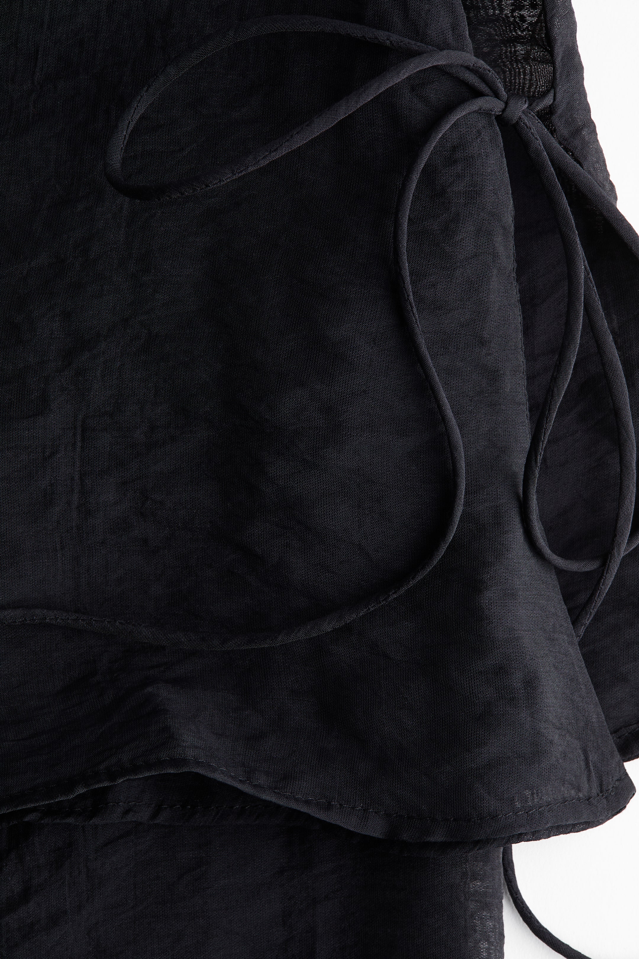 Pantalon avec jupe superposée