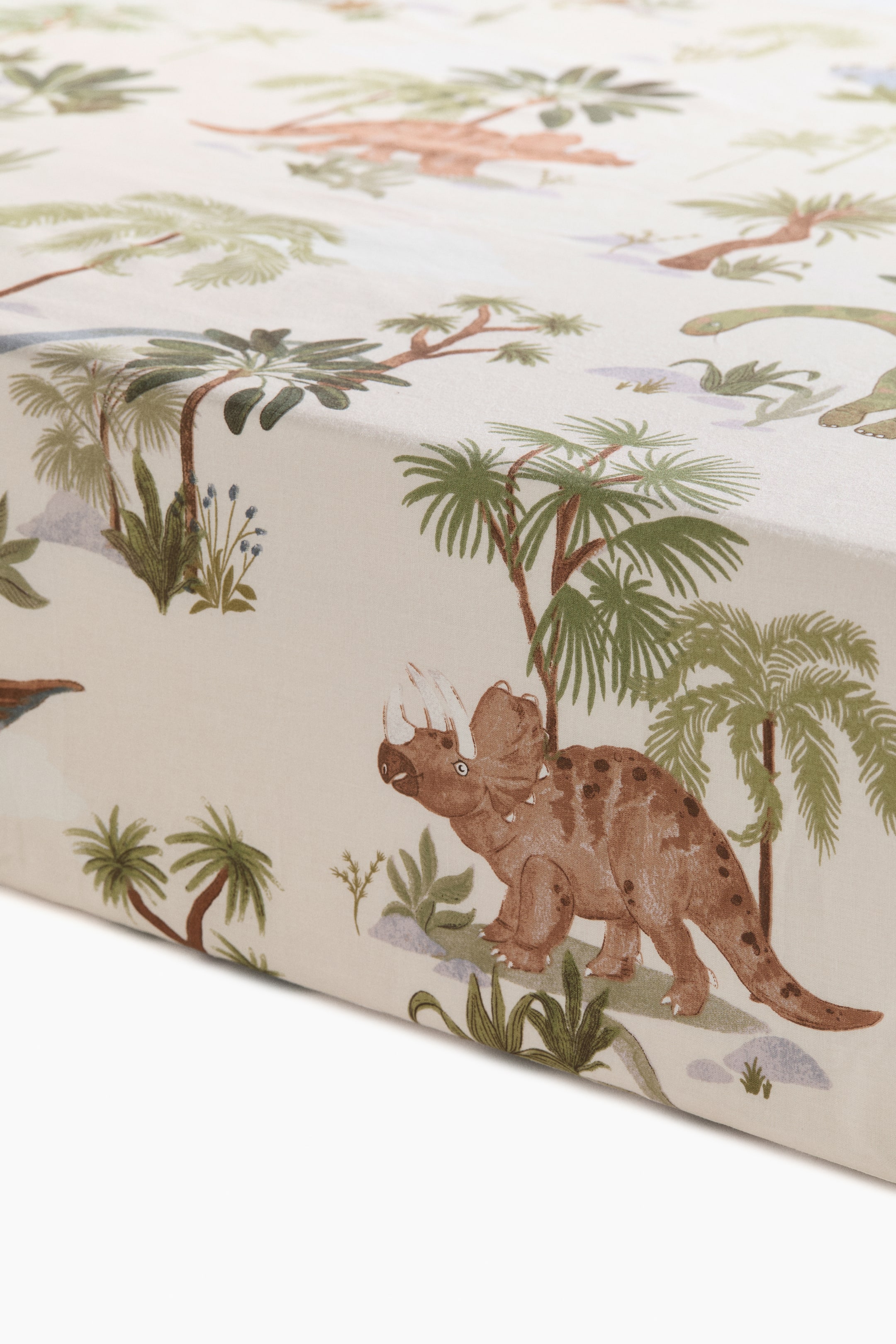 Visualizza immagine più grande: Lenzuolo con angoli in cotone fantasia - Beige chiaro/dinosauri - HOME | H&M IT 2