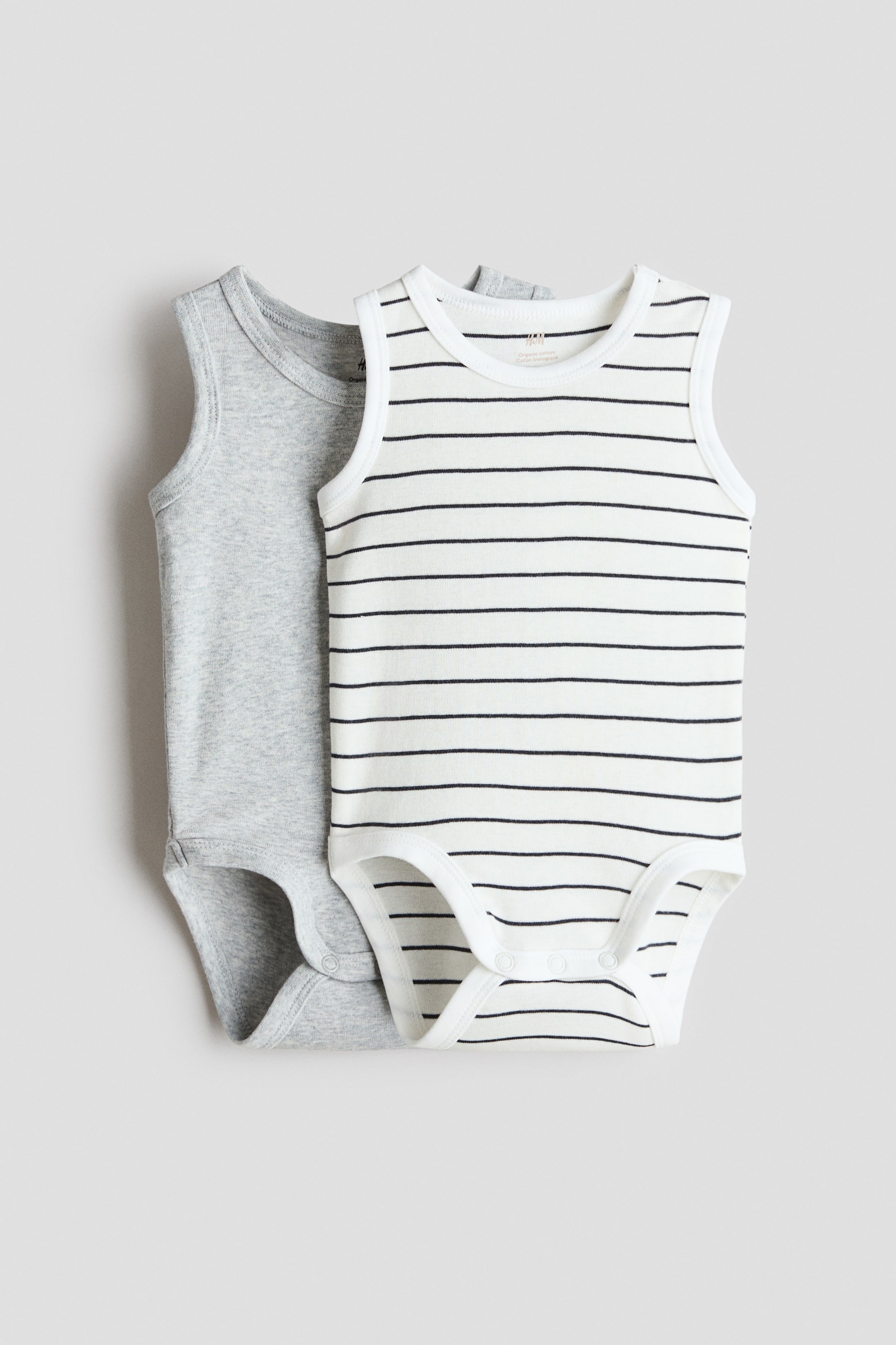 Ver imagen más grande: Pack de 2 bodies de algodón sin mangas - Gris claro/Rayas - NIÑOS | H&M ES 1