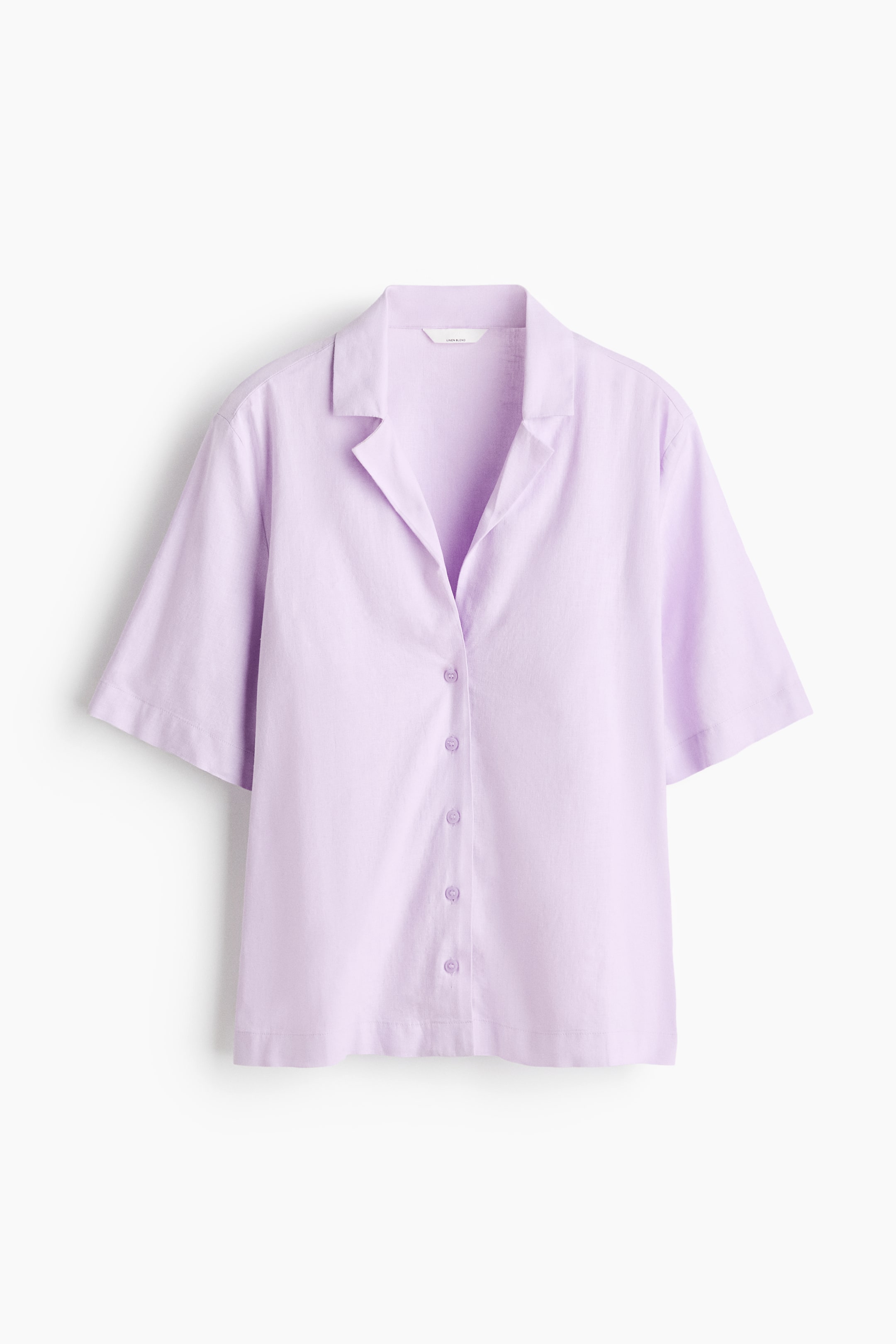 View larger image: A lavender short-sleeved shirt is facing front, featuring an open camp collar and a full button-front closure. It is displaying matching lavender buttons down the front, with short, wide sleeves and a straight hem.